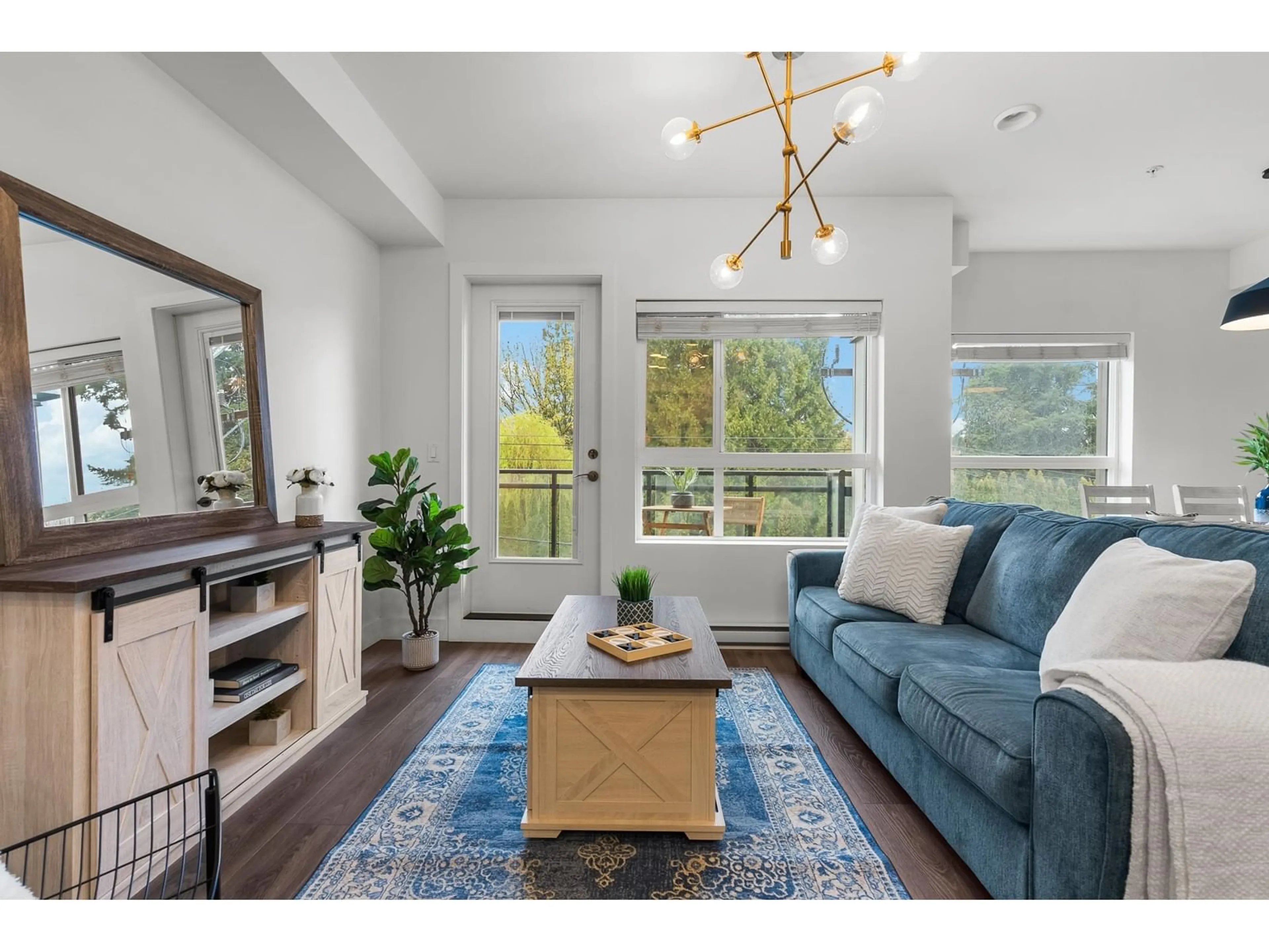 Living room, wood floors for 305 33568 GEORGE FERGUSON WAY, Abbotsford British Columbia V2S0M3