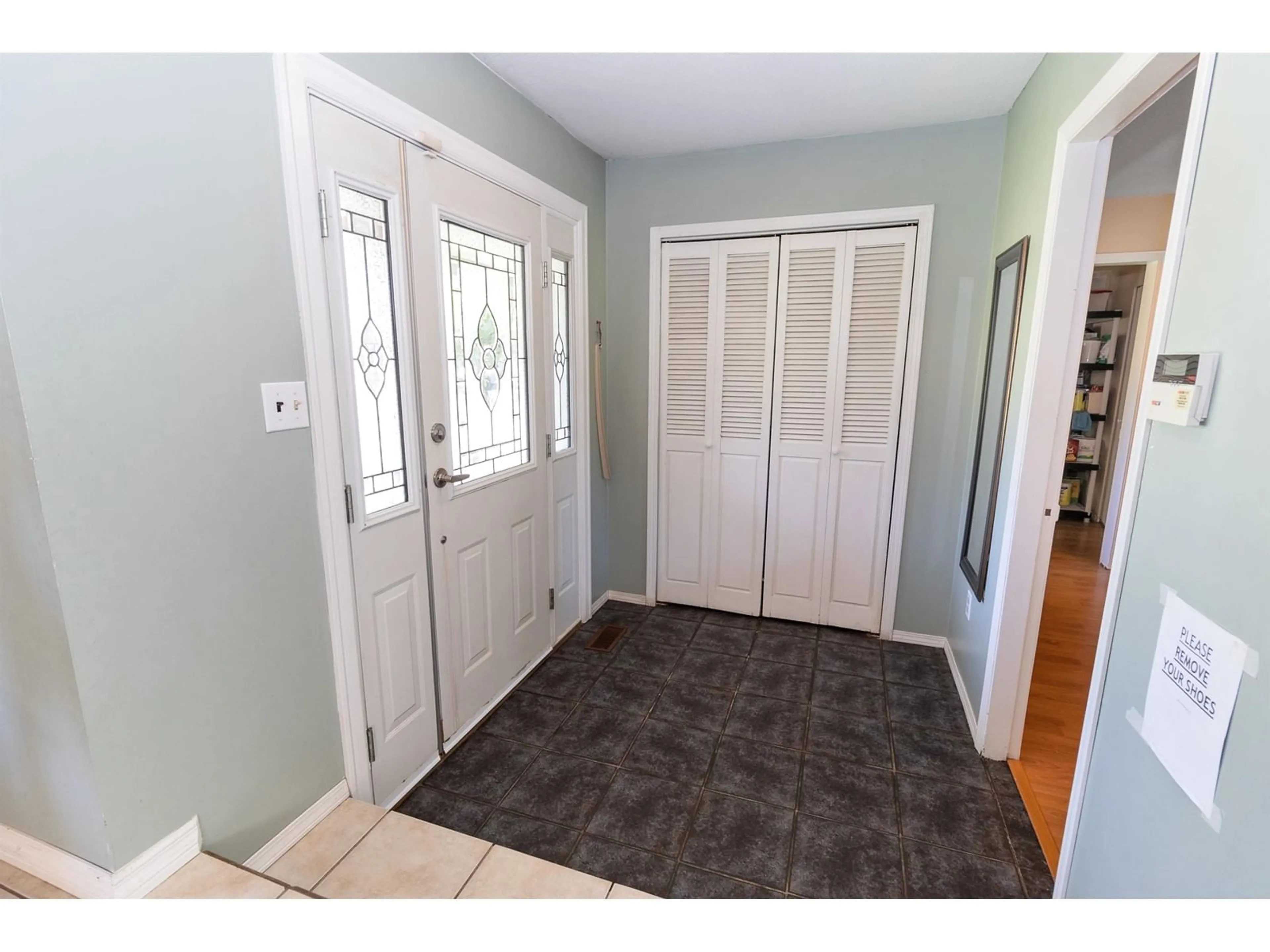 Indoor entryway, wood floors for 2551 ADELAIDE STREET, Abbotsford British Columbia V2T3L9