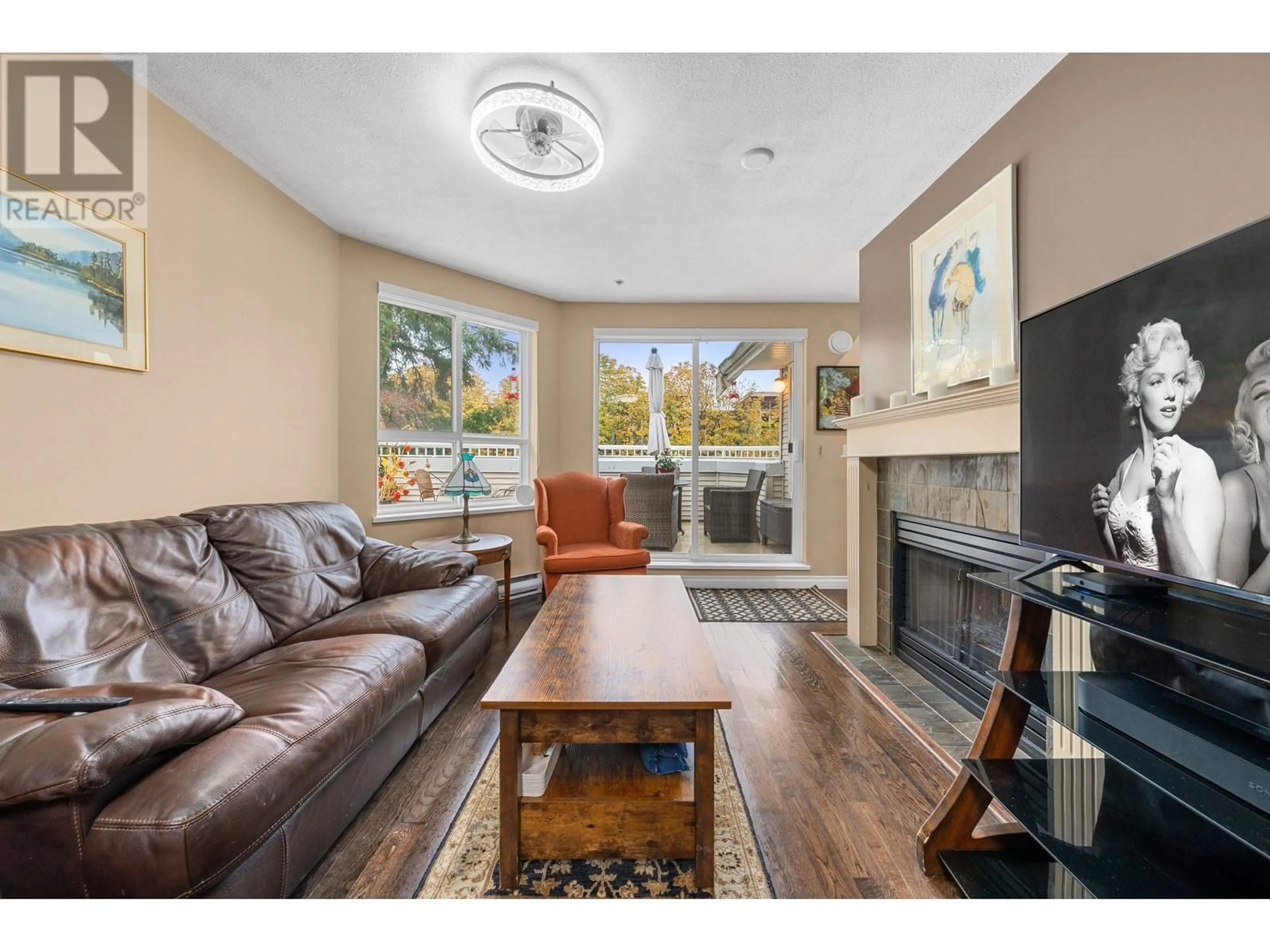 Living room, wood floors for 402 130 W 22ND STREET, North Vancouver British Columbia V7M1Z9