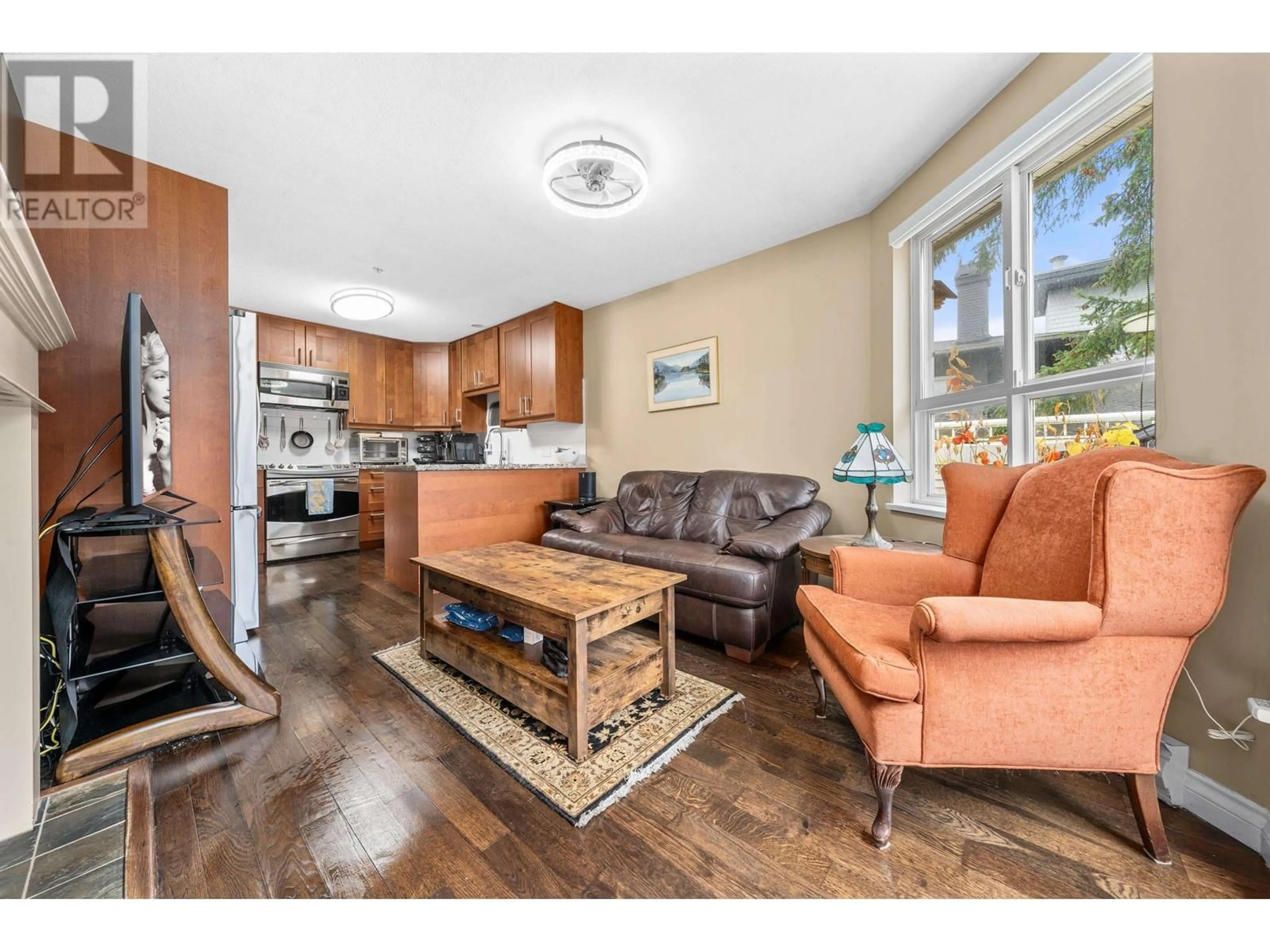 Living room, wood floors for 402 130 W 22ND STREET, North Vancouver British Columbia V7M1Z9