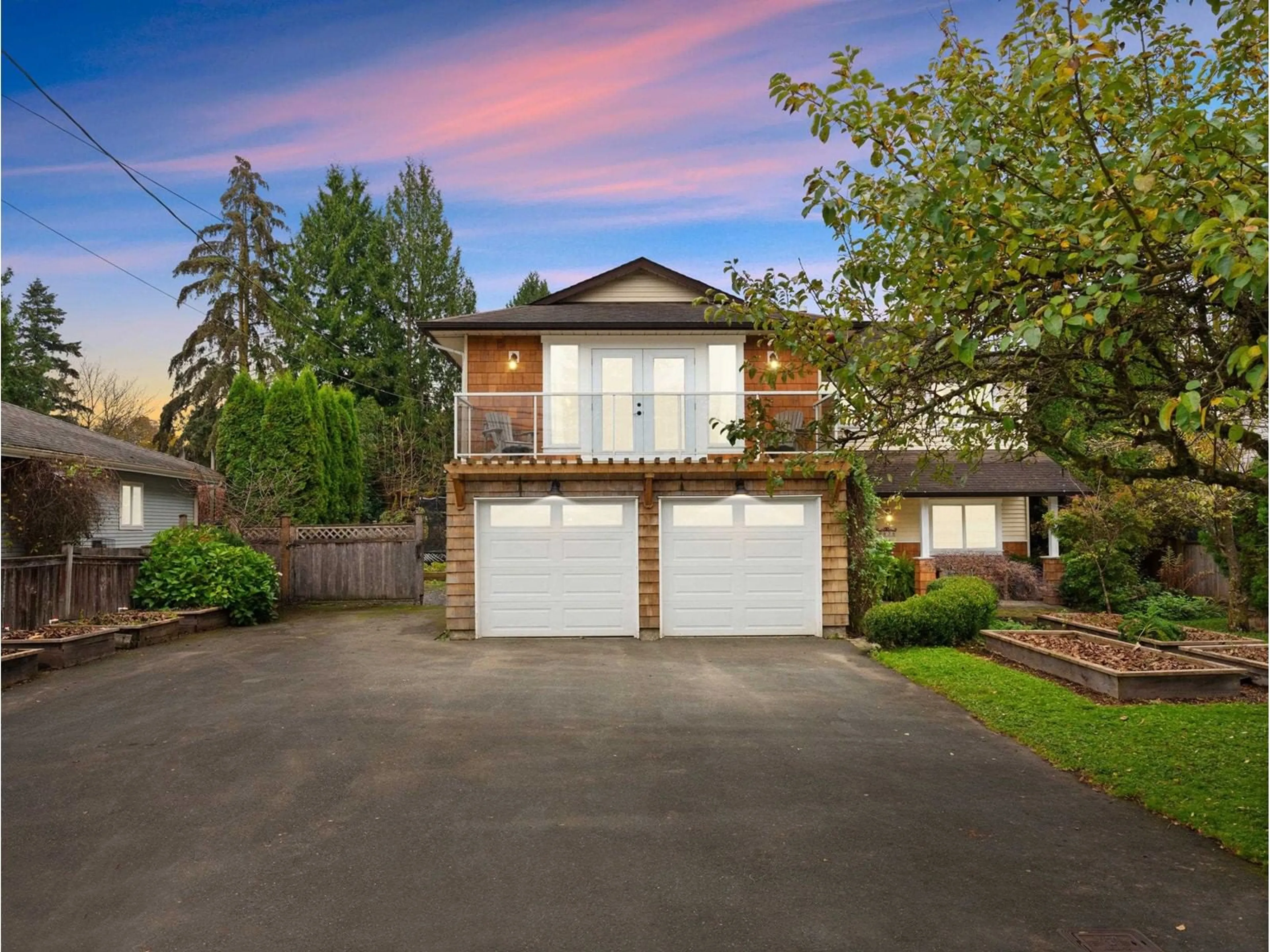 Frontside or backside of a home, the fenced backyard for 8826 BARTLETT STREET, Langley British Columbia V1M2S3