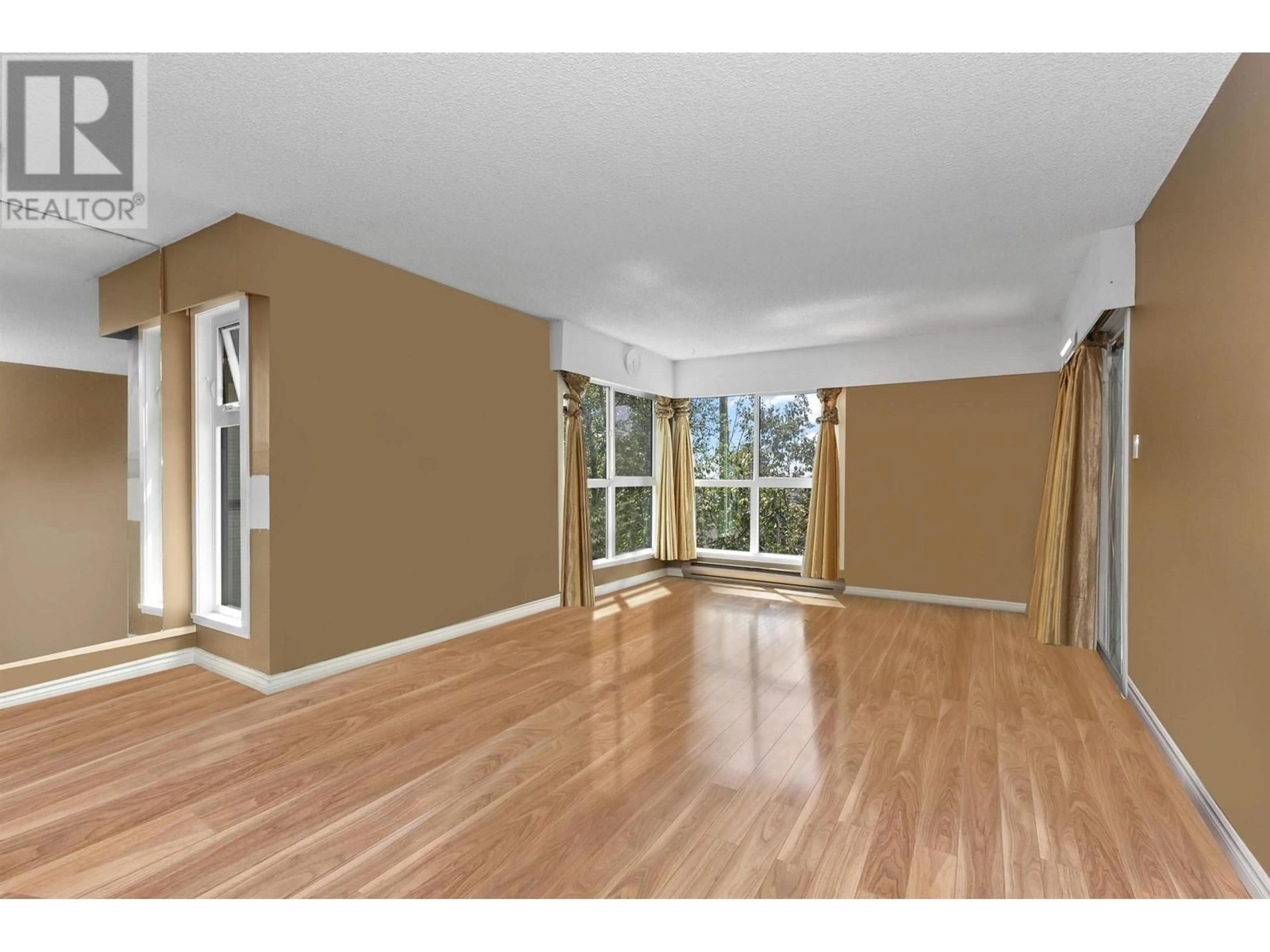 A pic of a room, wood floors for 205 215 MOWAT STREET, New Westminster British Columbia V3M4B1