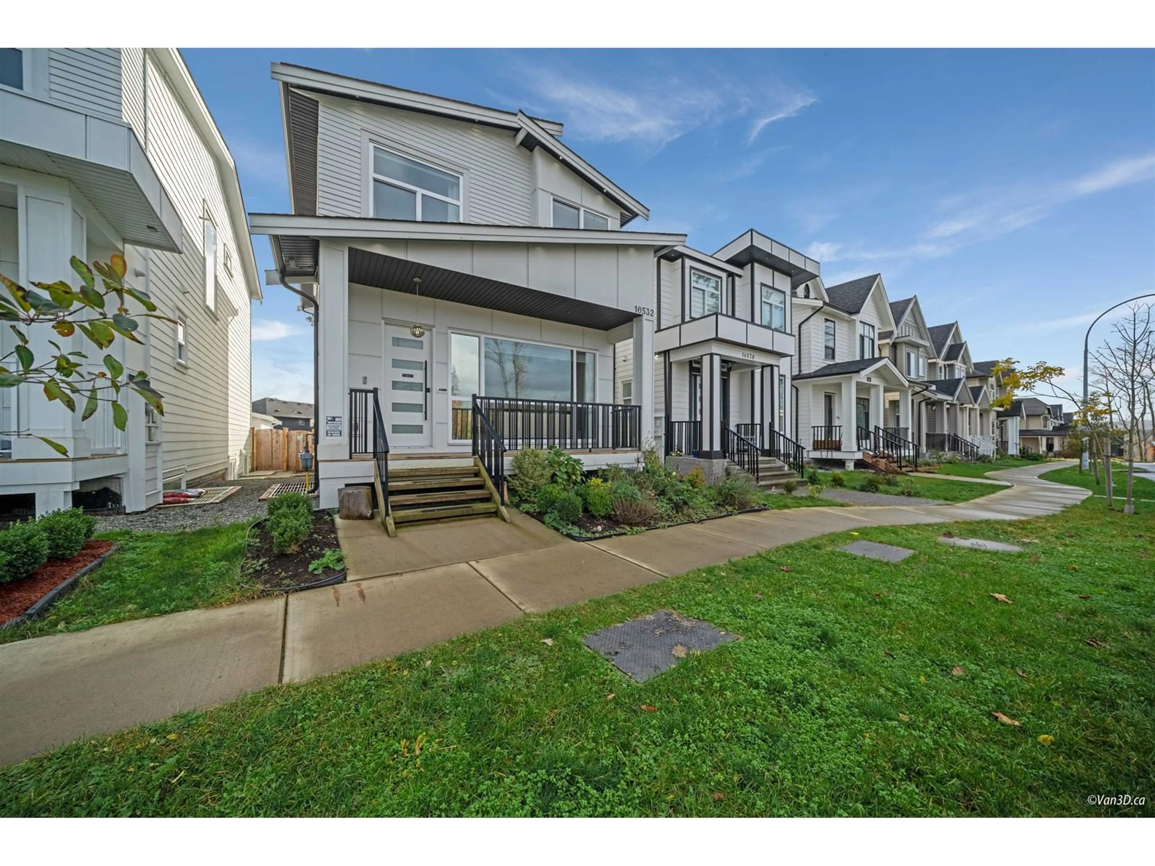 A pic from exterior of the house or condo, the fenced backyard for 16532 22 AVENUE, Surrey British Columbia V3Z0V5