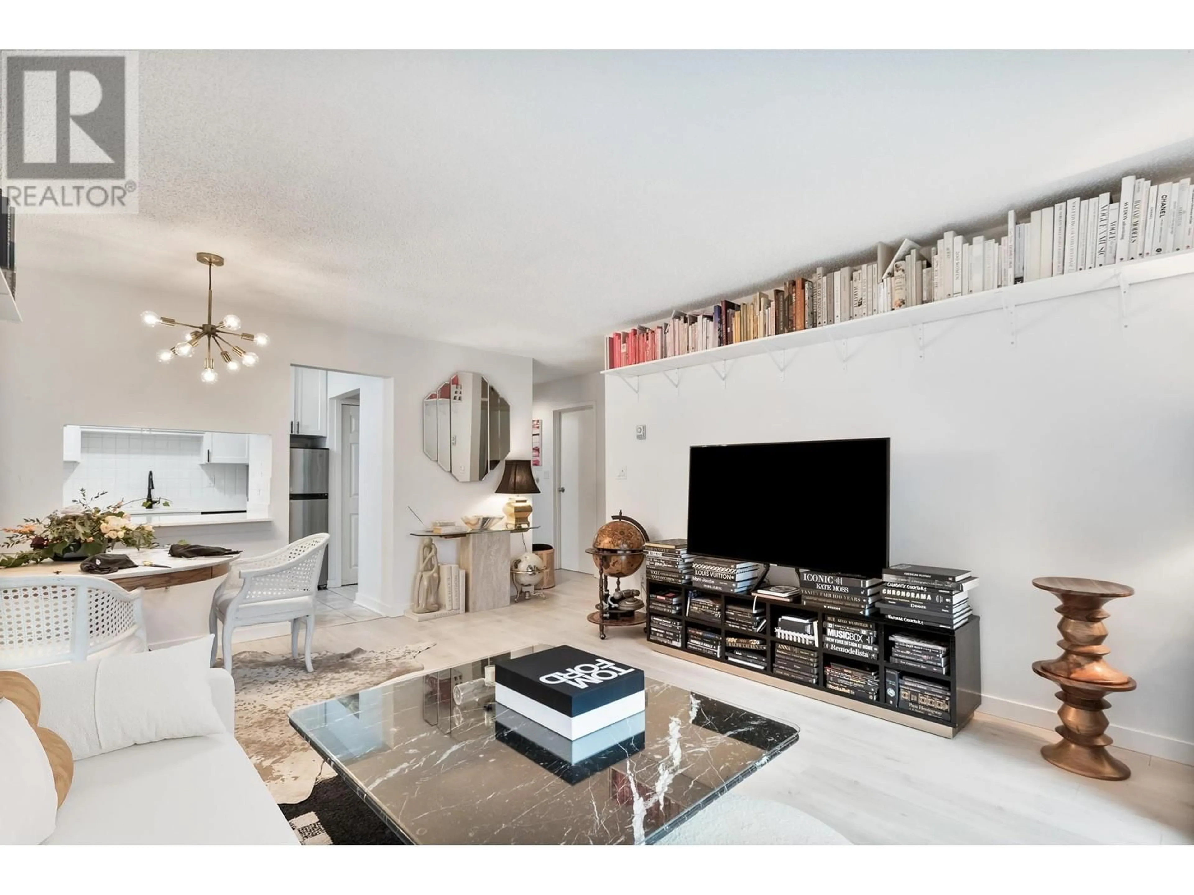 Living room, wood floors for 107 1990 W 6TH AVENUE, Vancouver British Columbia V6J4V4