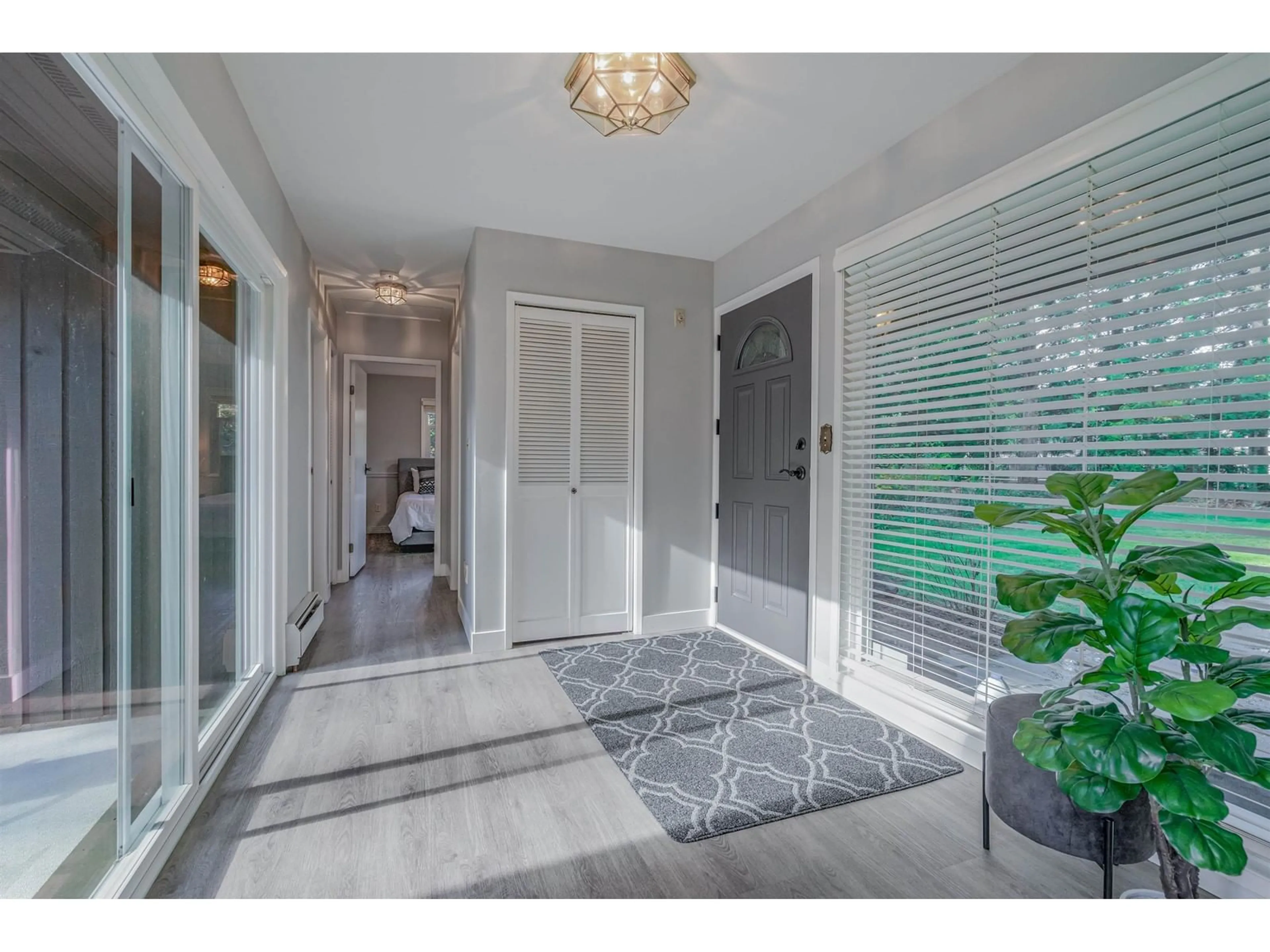 Indoor entryway, wood floors for 20264 27 AVENUE, Langley British Columbia V2Z1X3