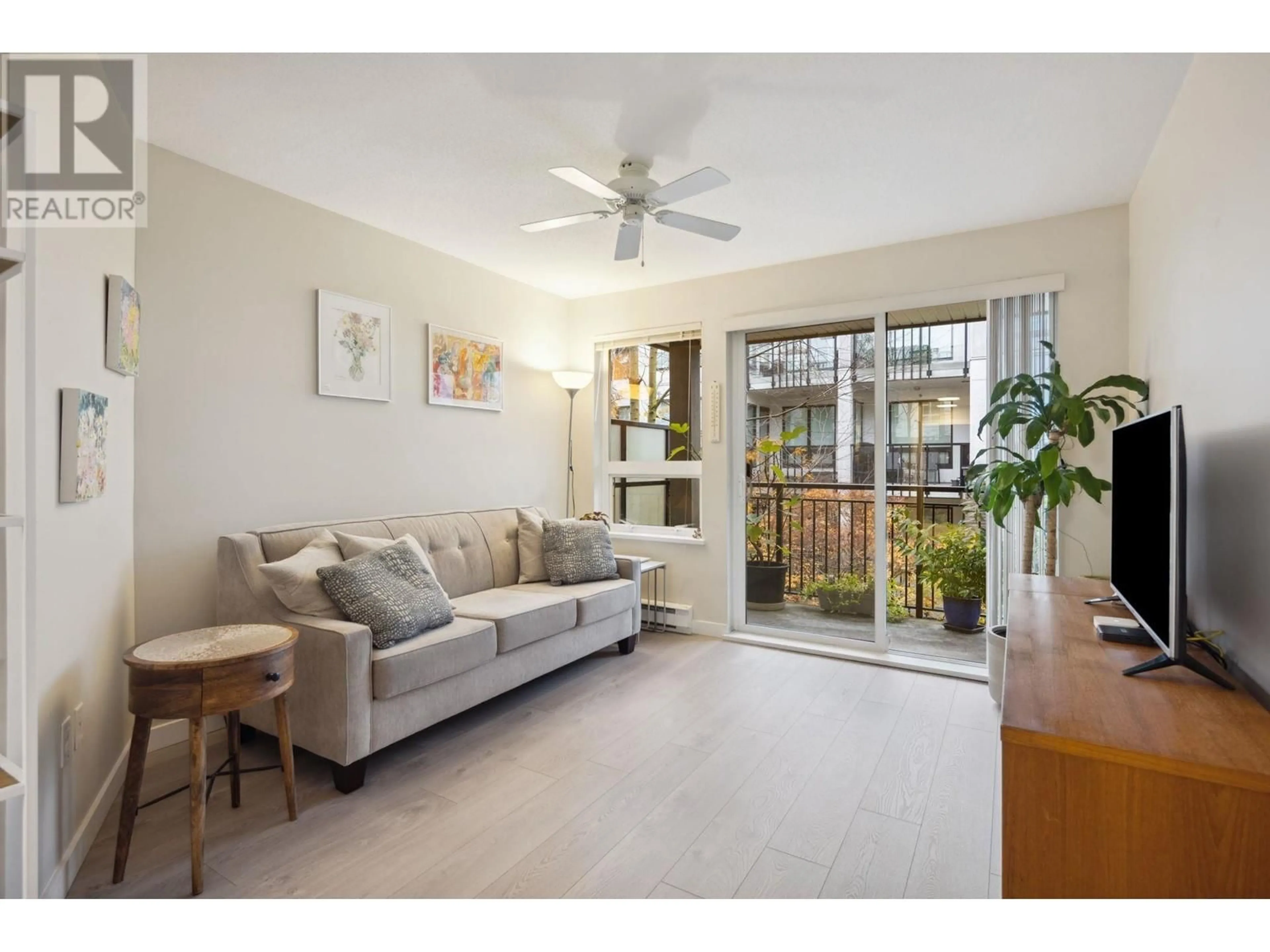 Living room, wood floors for 306 9399 TOMICKI AVENUE, Richmond British Columbia V6X0H6