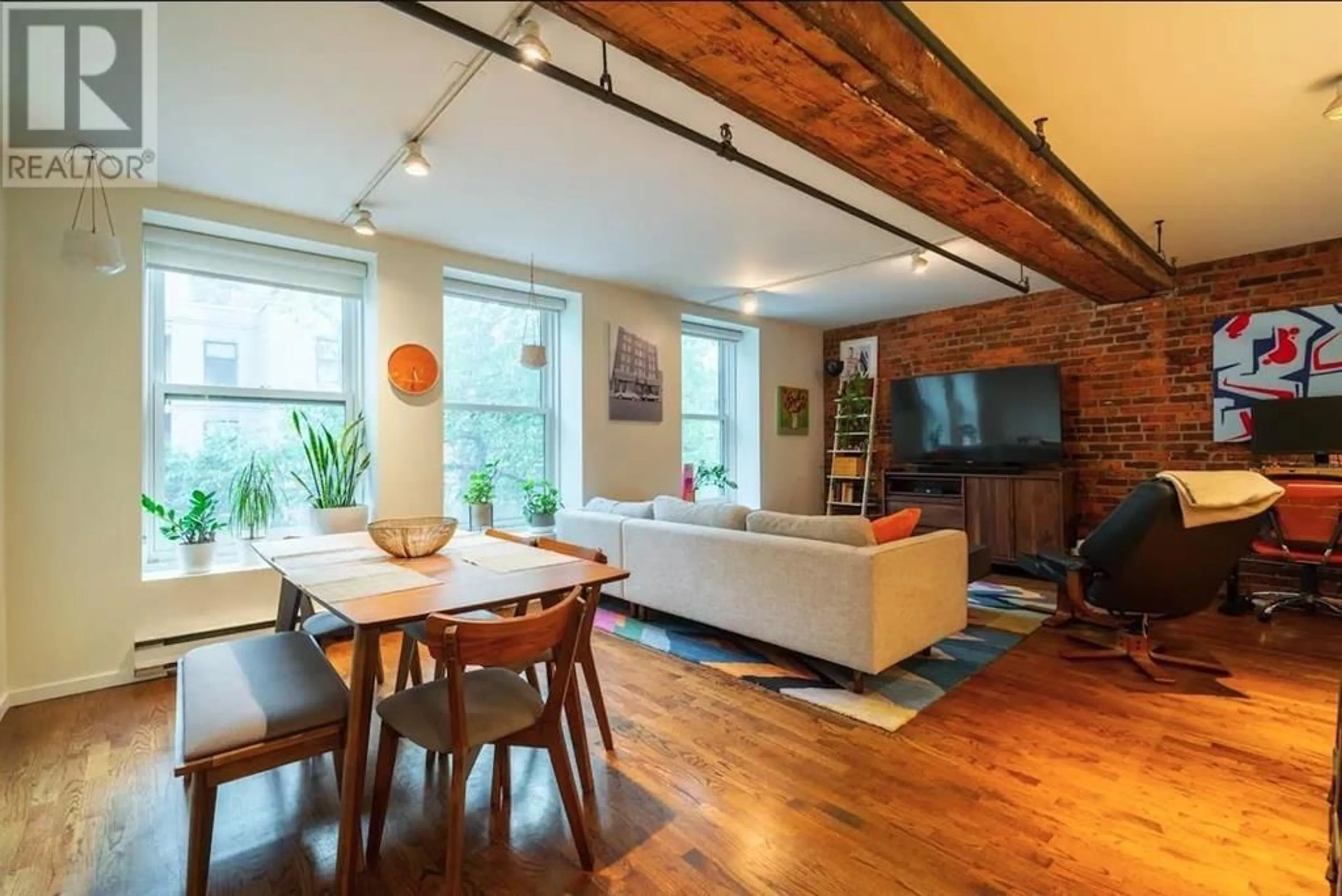 Living room, wood floors for 203 150 ALEXANDER STREET, Vancouver British Columbia V6A1B5