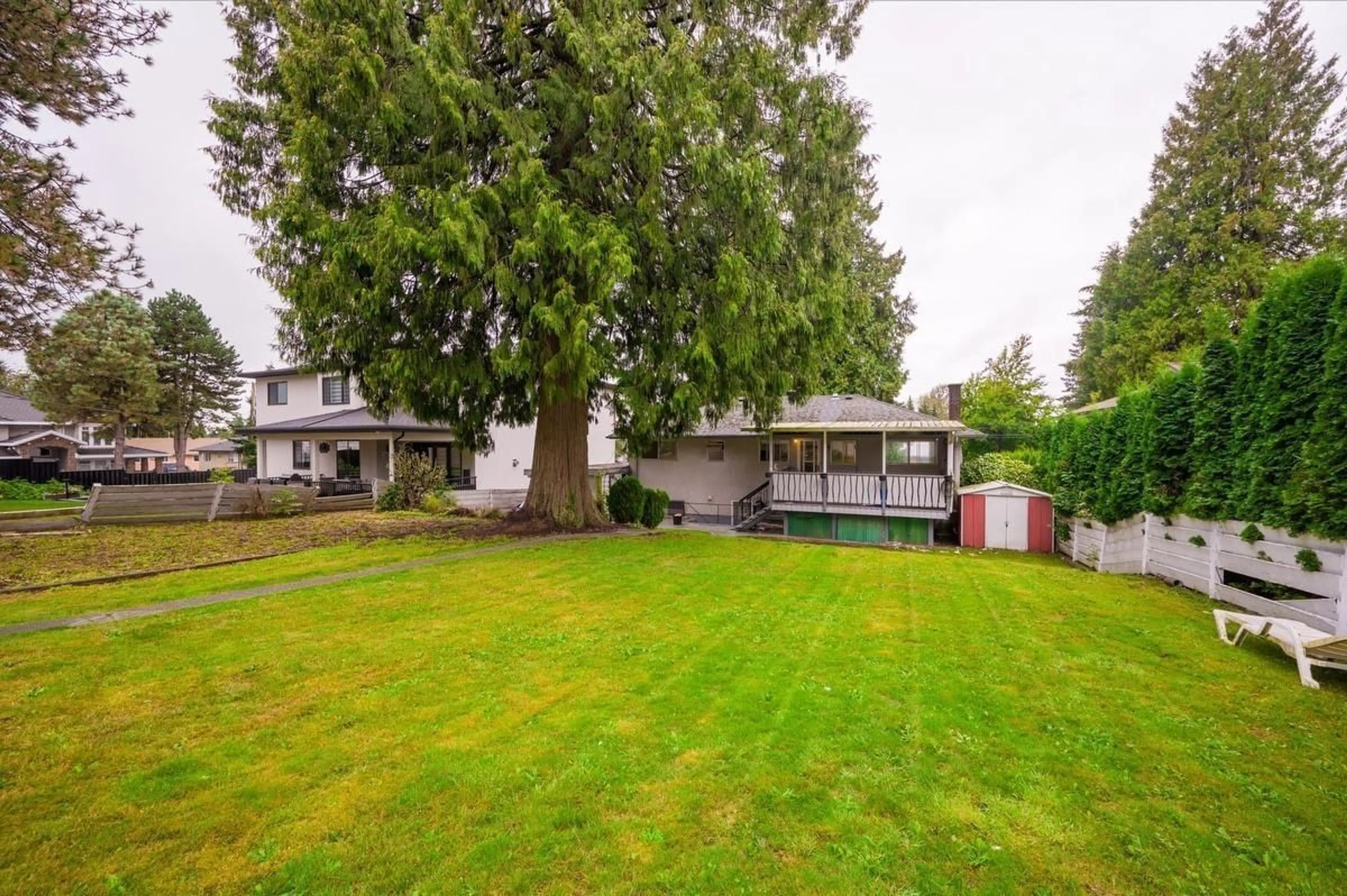 Frontside or backside of a home, the fenced backyard for 10024 SEMIAHMOO ROAD, Surrey British Columbia V3T3M8