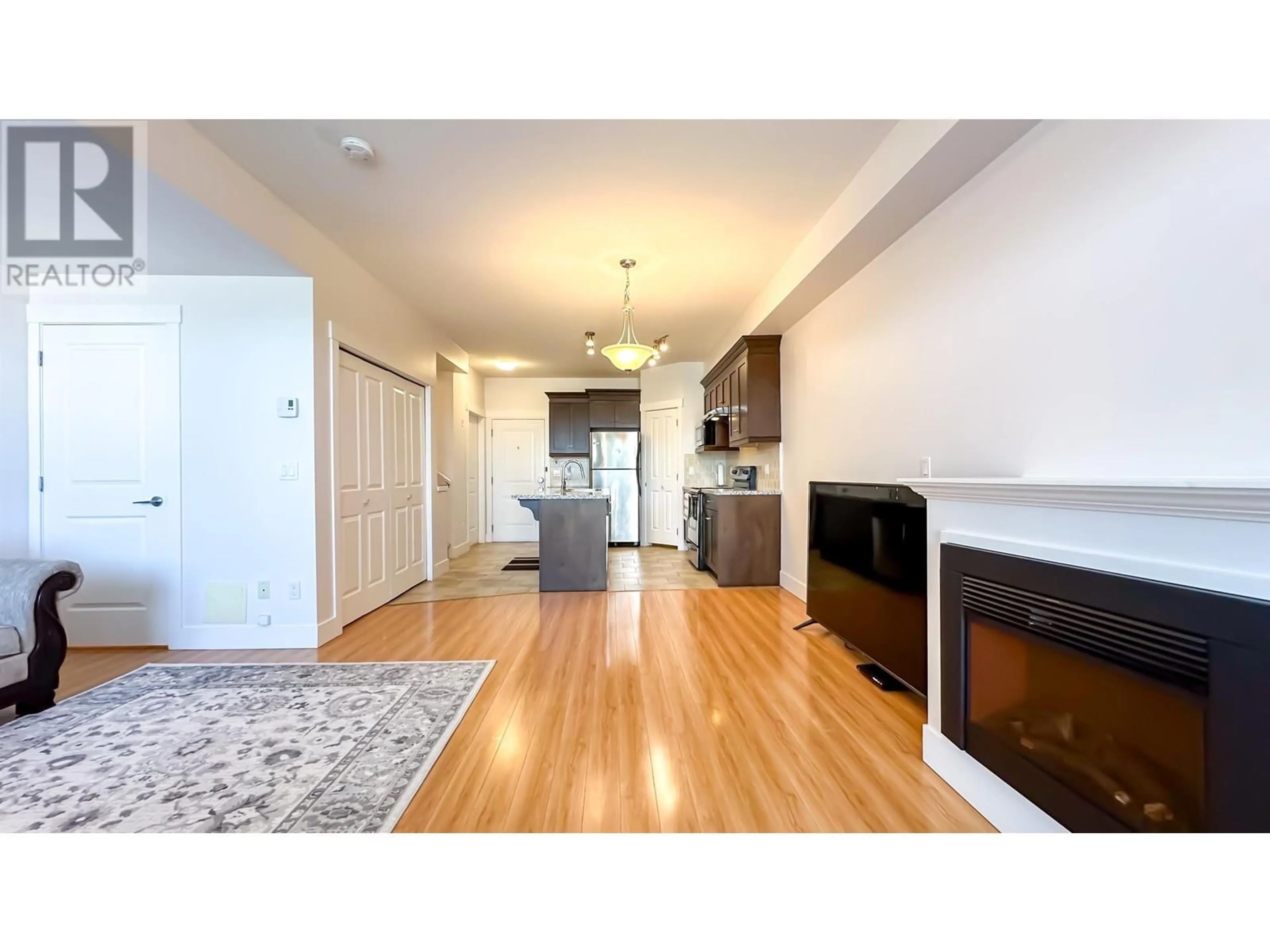 A pic of a room, wood floors for 205 7908 GRAHAM AVENUE, Burnaby British Columbia V3N1V9