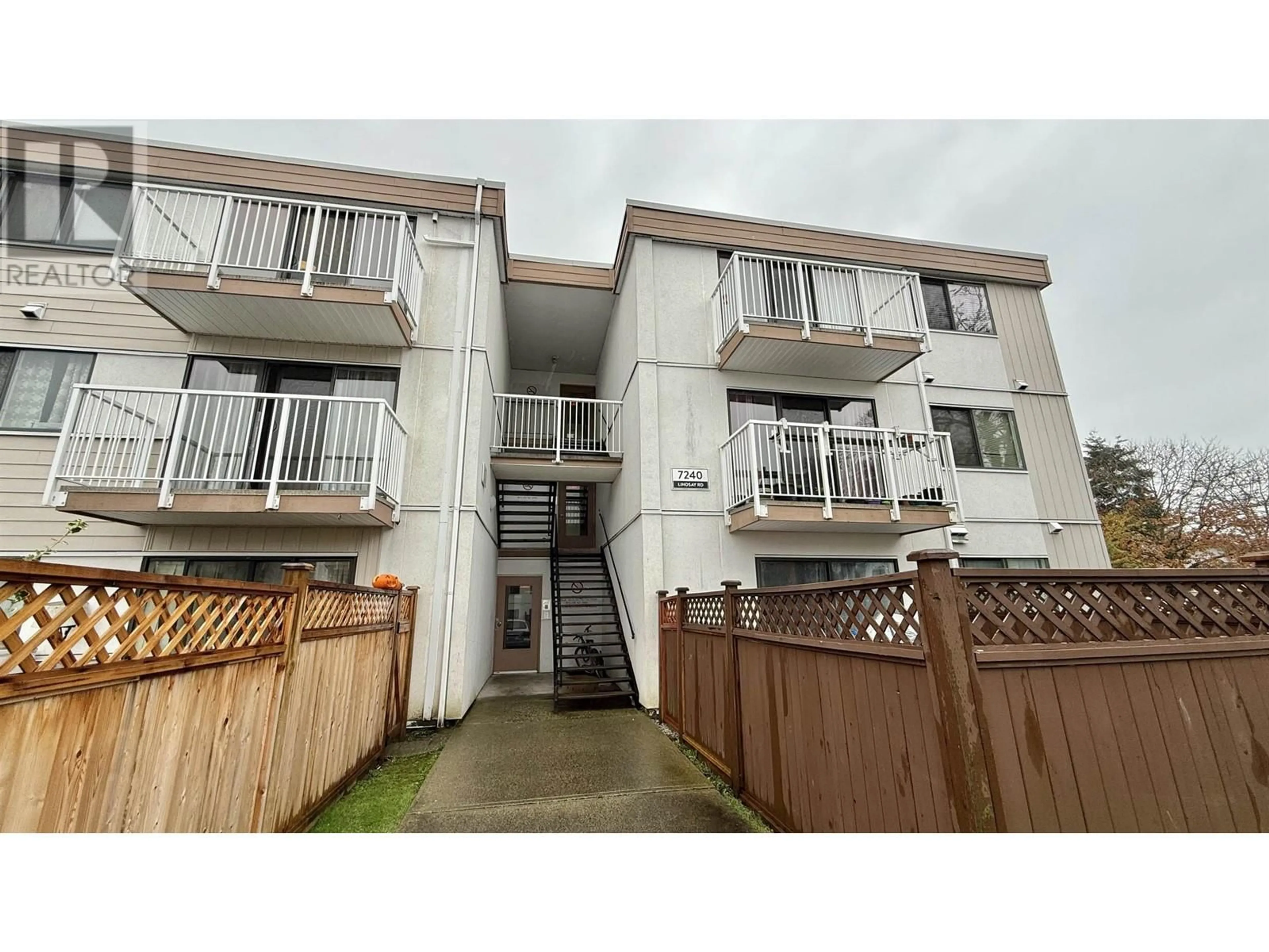 A pic from exterior of the house or condo, the fenced backyard for 315 7240 LINDSAY ROAD, Richmond British Columbia V7C3M6