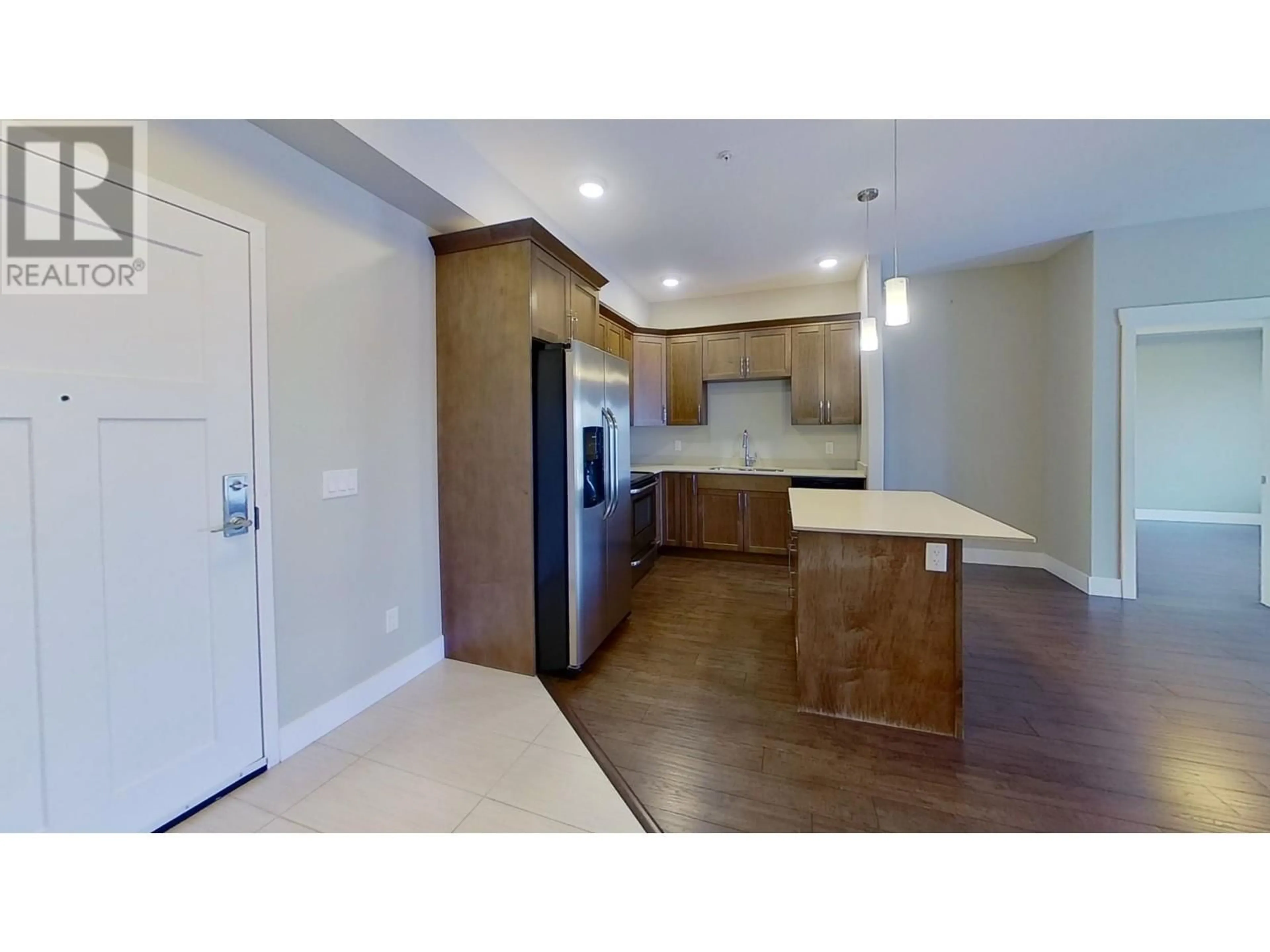 Open concept kitchen, unknown for 106 - 11205 105 AVENUE, Fort St. John British Columbia V1J0L3