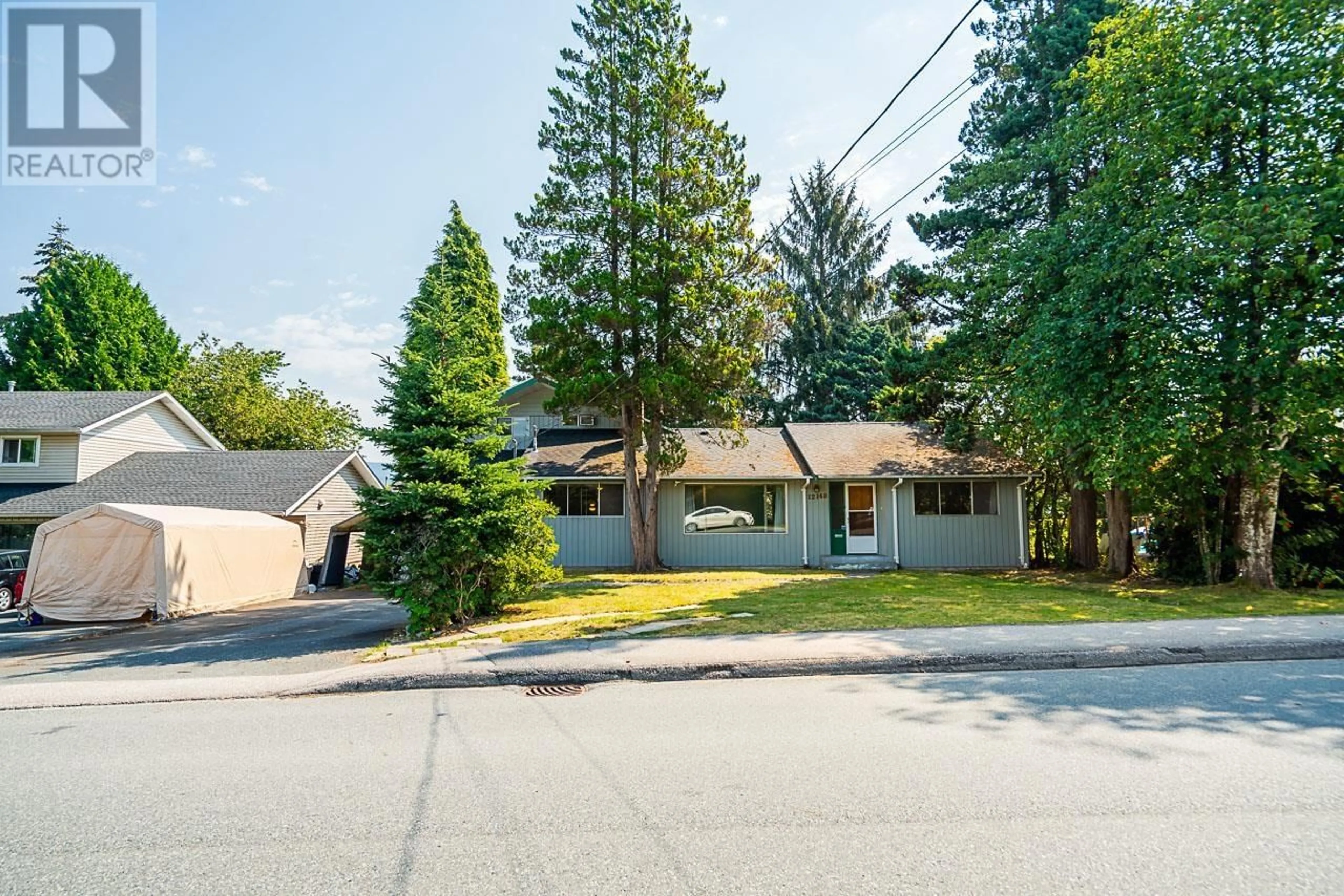 A pic from exterior of the house or condo, the street view for 12140 230 STREET, Maple Ridge British Columbia V2X6R5