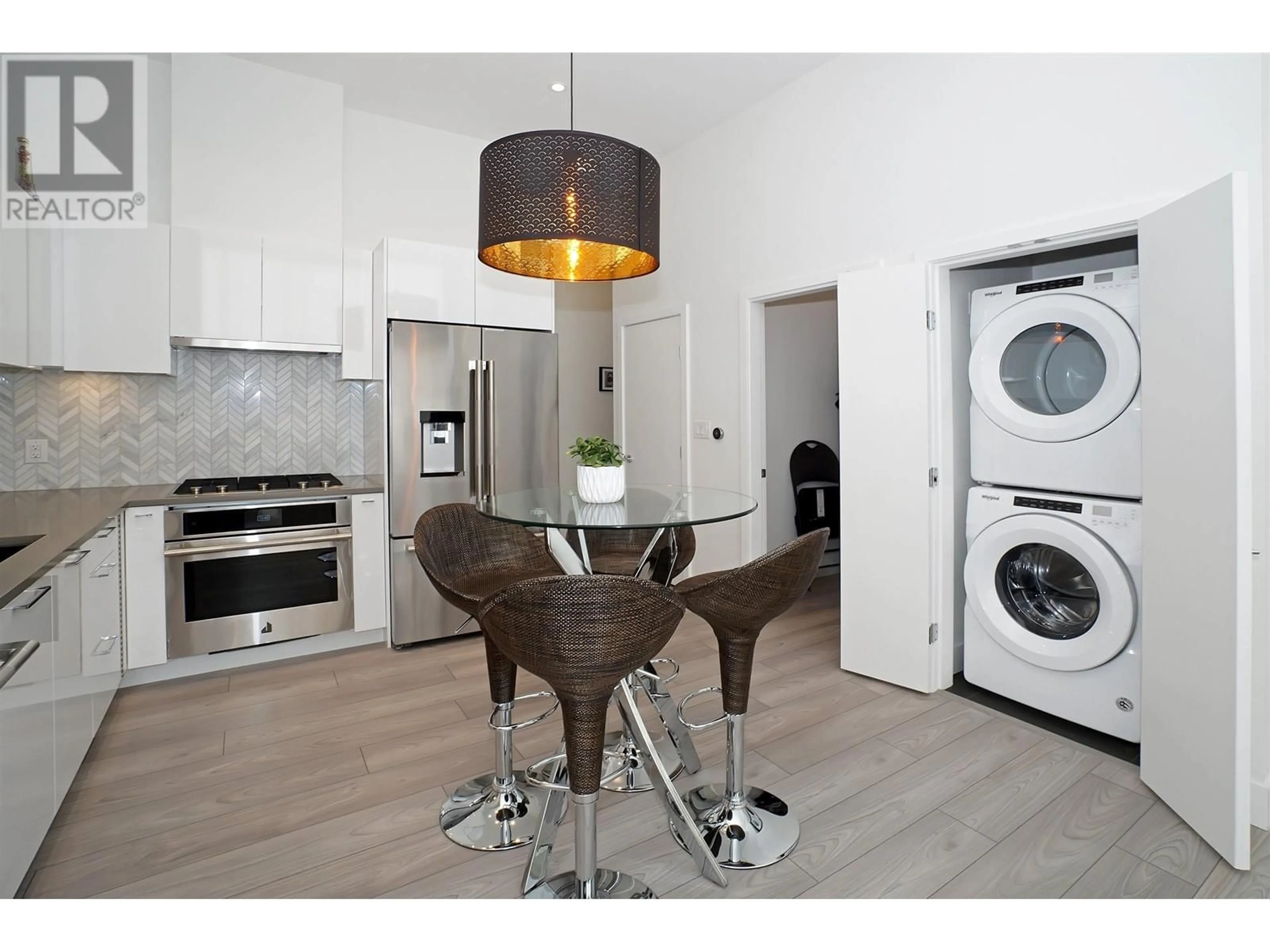 Open concept kitchen for 102 8570 RIVERGRASS DRIVE, Vancouver British Columbia V5S0H4