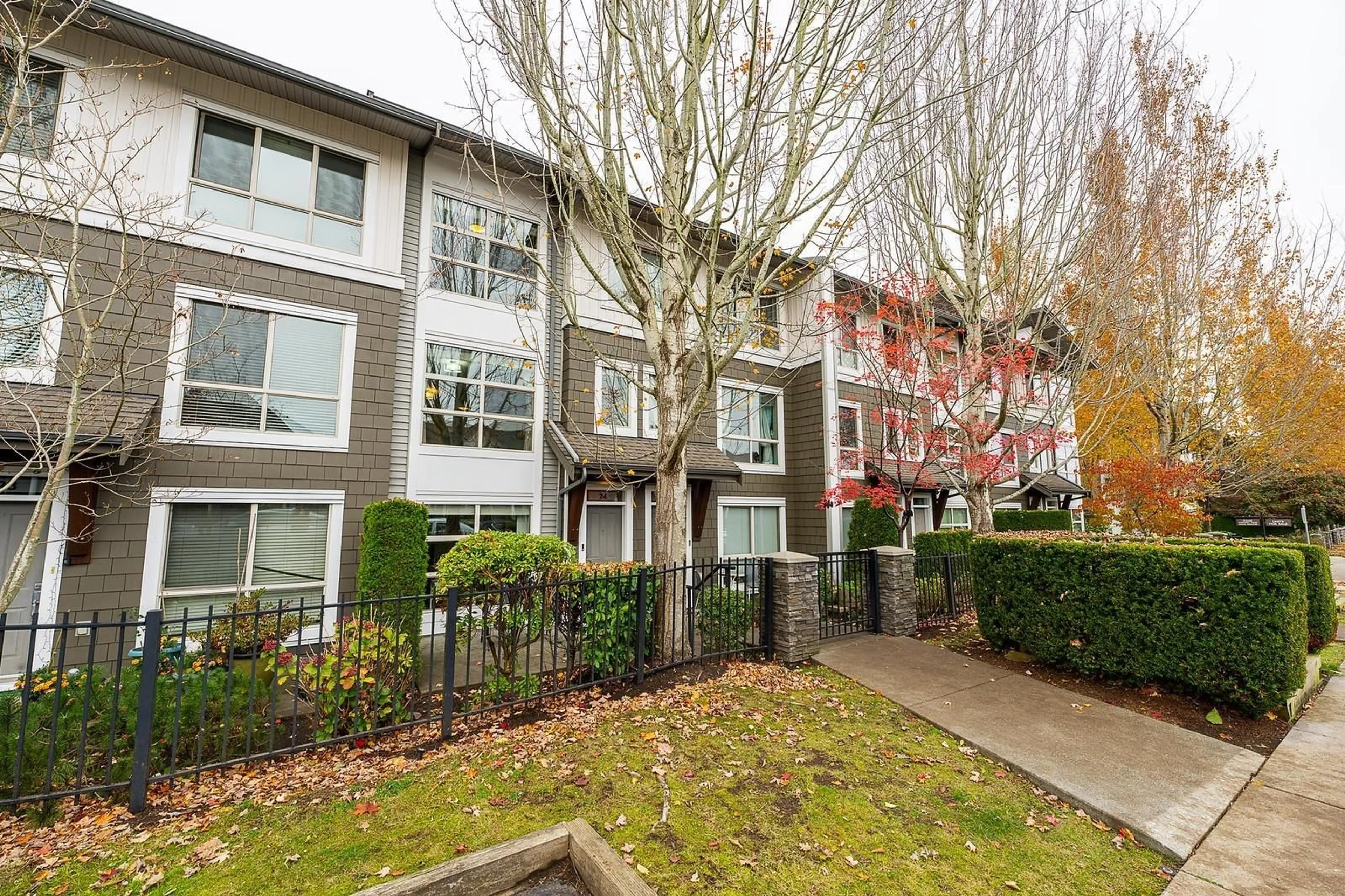 A pic from exterior of the house or condo, the fenced backyard for 24 6671 121 STREET, Surrey British Columbia V3W1T9