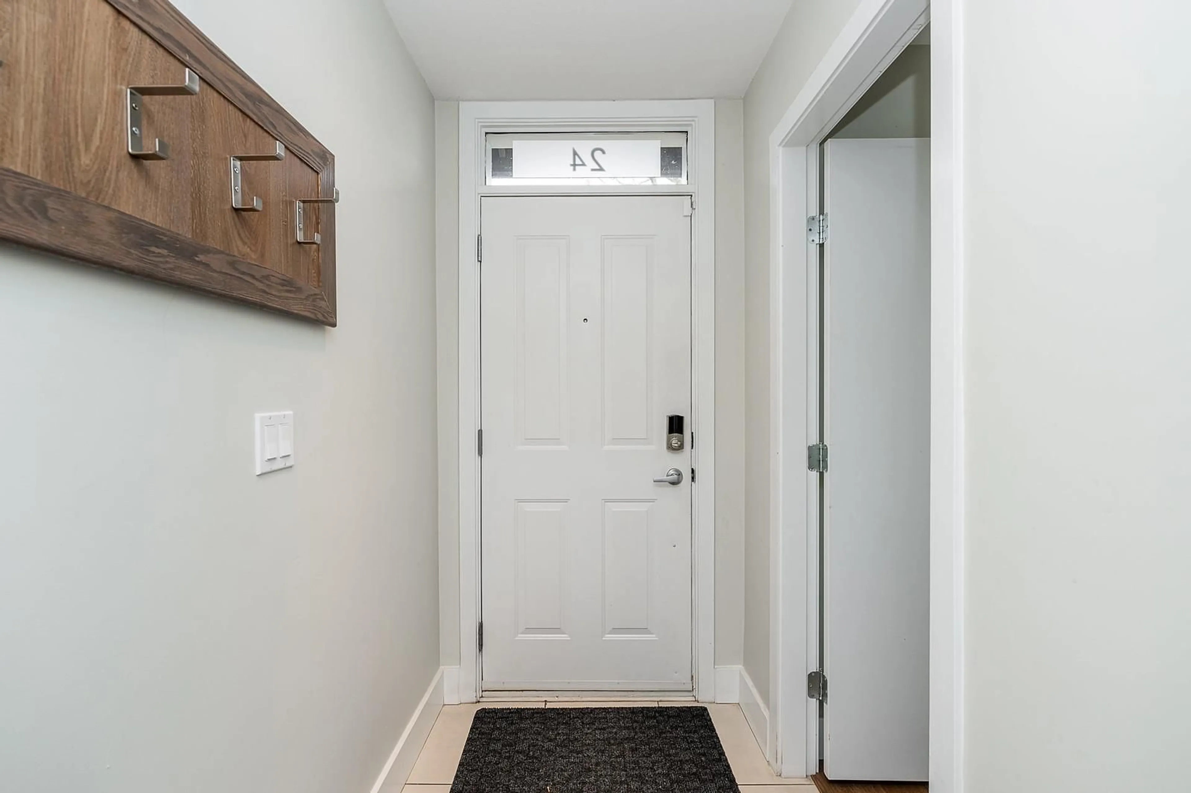 Indoor entryway, wood floors for 24 6671 121 STREET, Surrey British Columbia V3W1T9