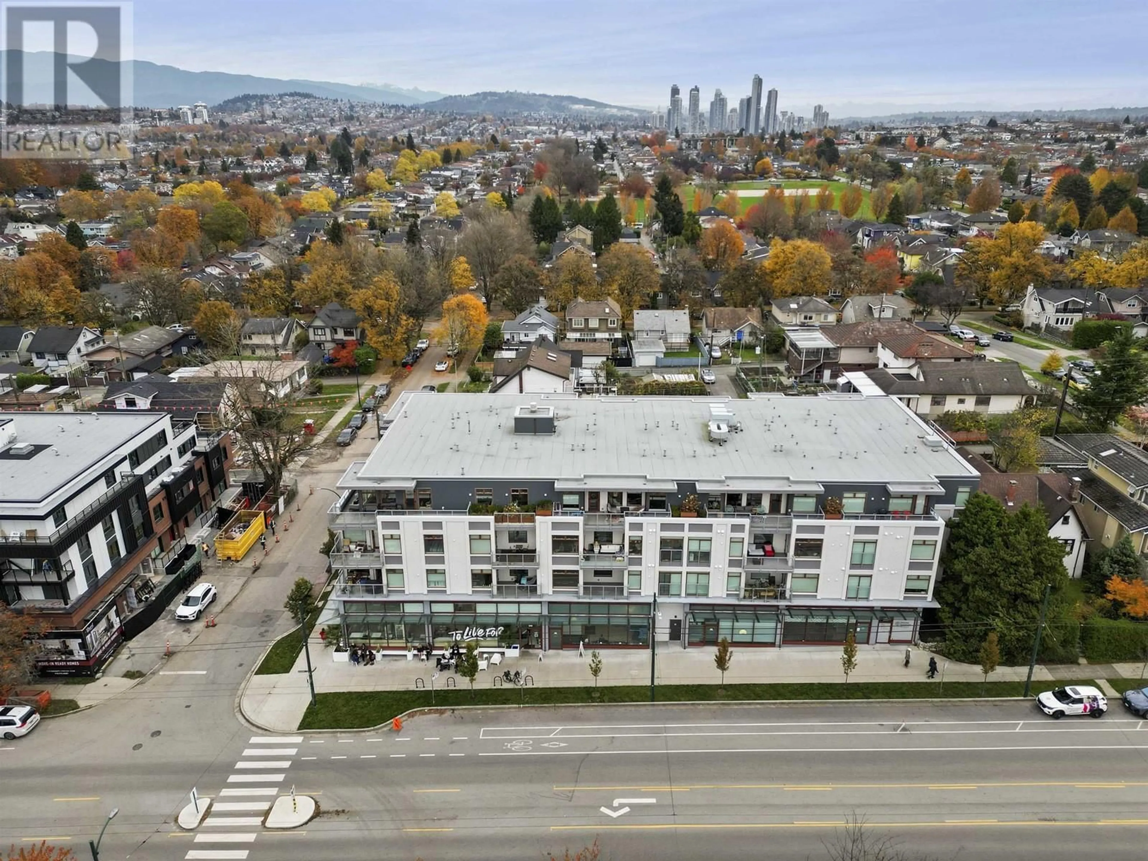 A pic from exterior of the house or condo, the front or back of building for 210 2408 GRANT STREET, Vancouver British Columbia V5K3G4