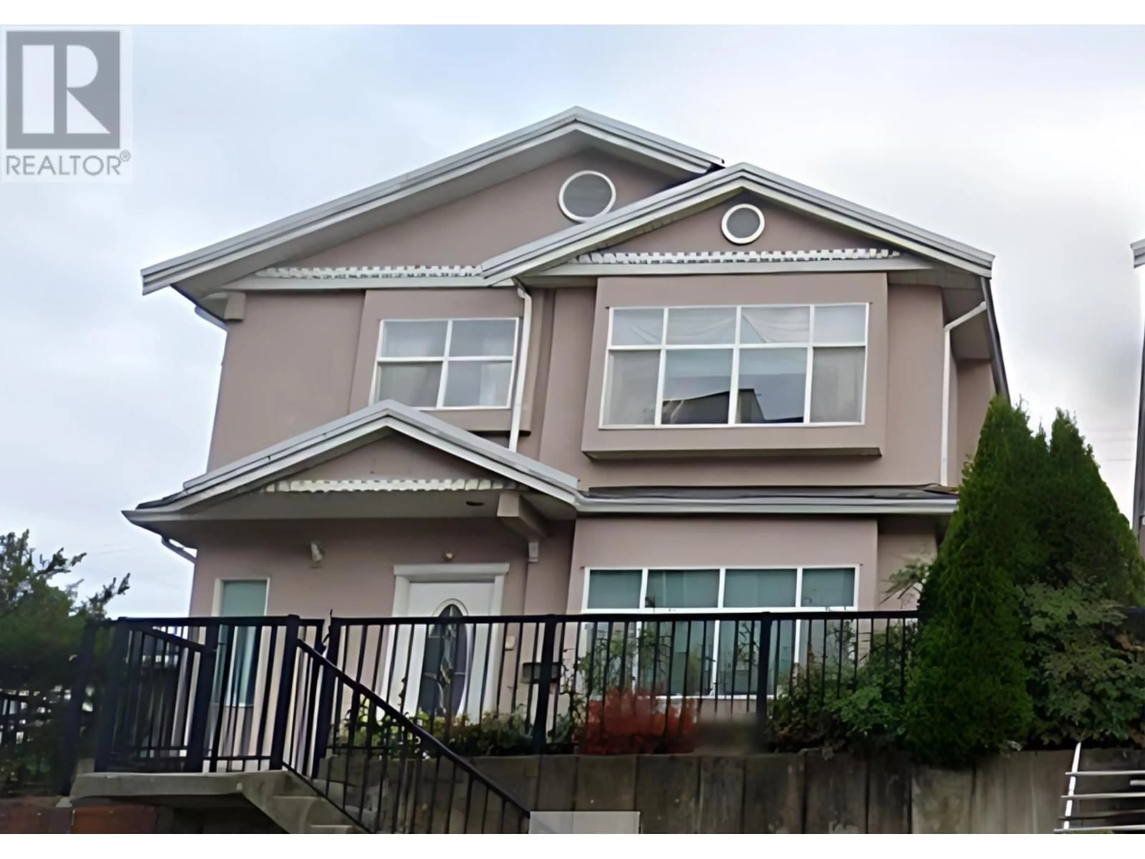 Frontside or backside of a home, the front or back of building for 2361 KINGSWAY, Vancouver British Columbia V5R5G8