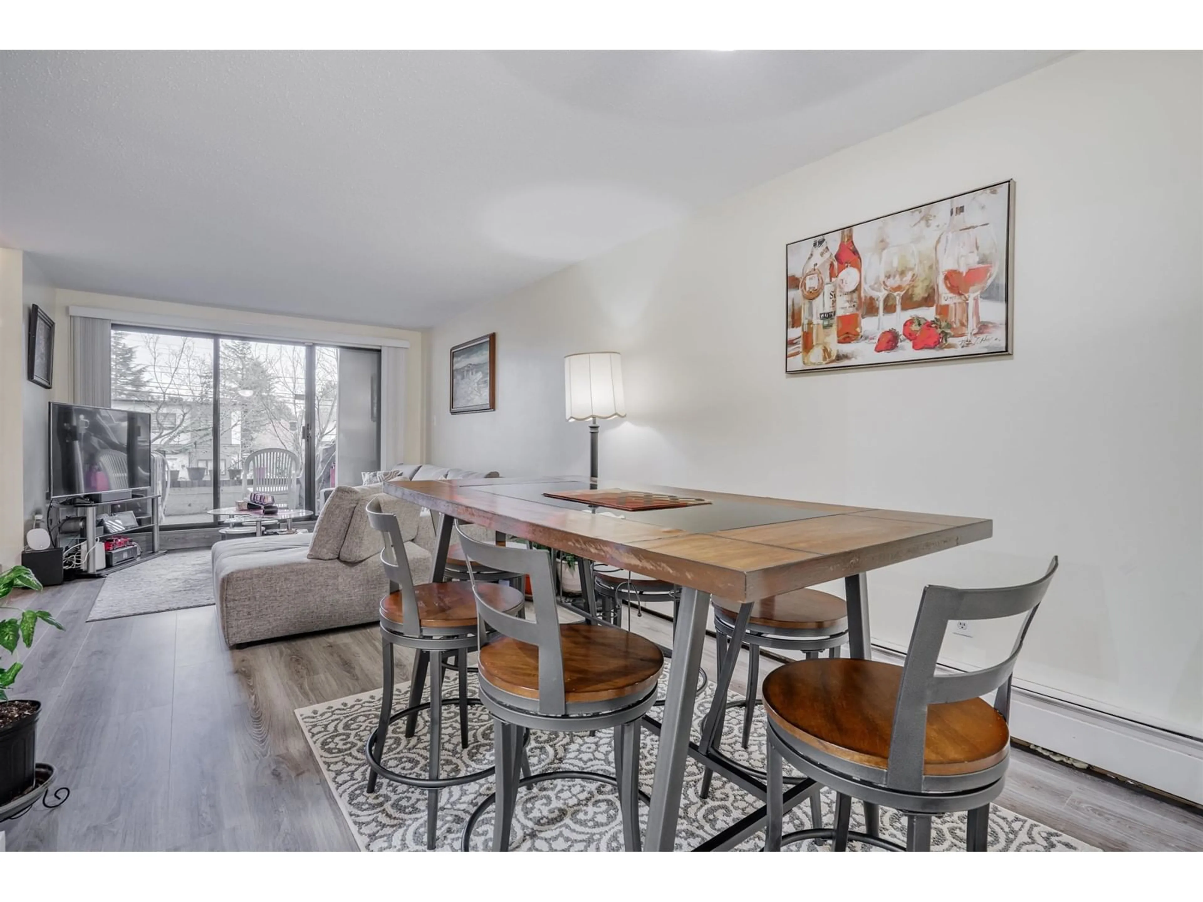 Dining room, wood floors for 103 7473 140 STREET, Surrey British Columbia V3W6G5