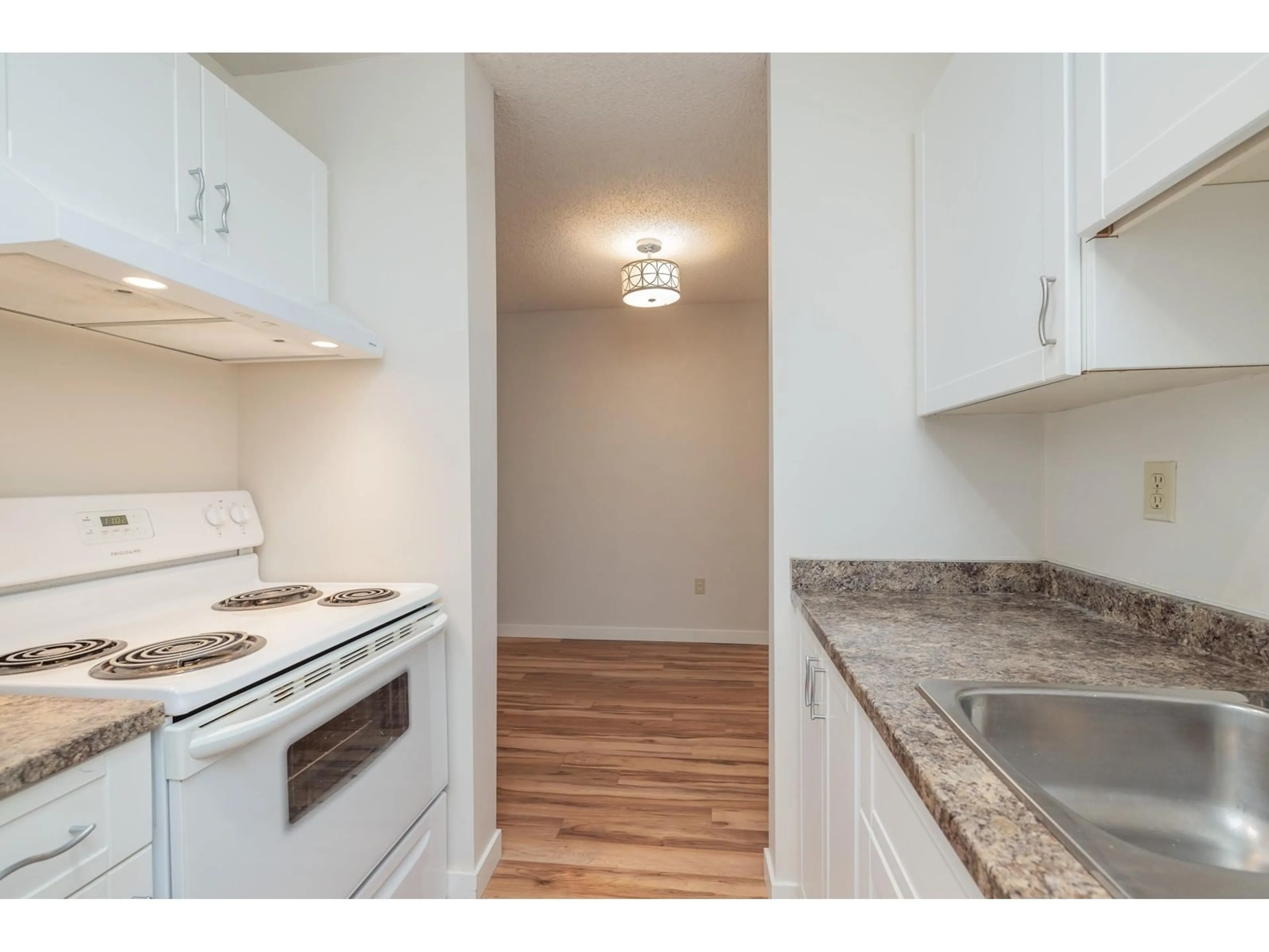 Standard kitchen, wood floors for 203 1850 E SOUTHMERE CRESCENT, Surrey British Columbia V4A6Y6