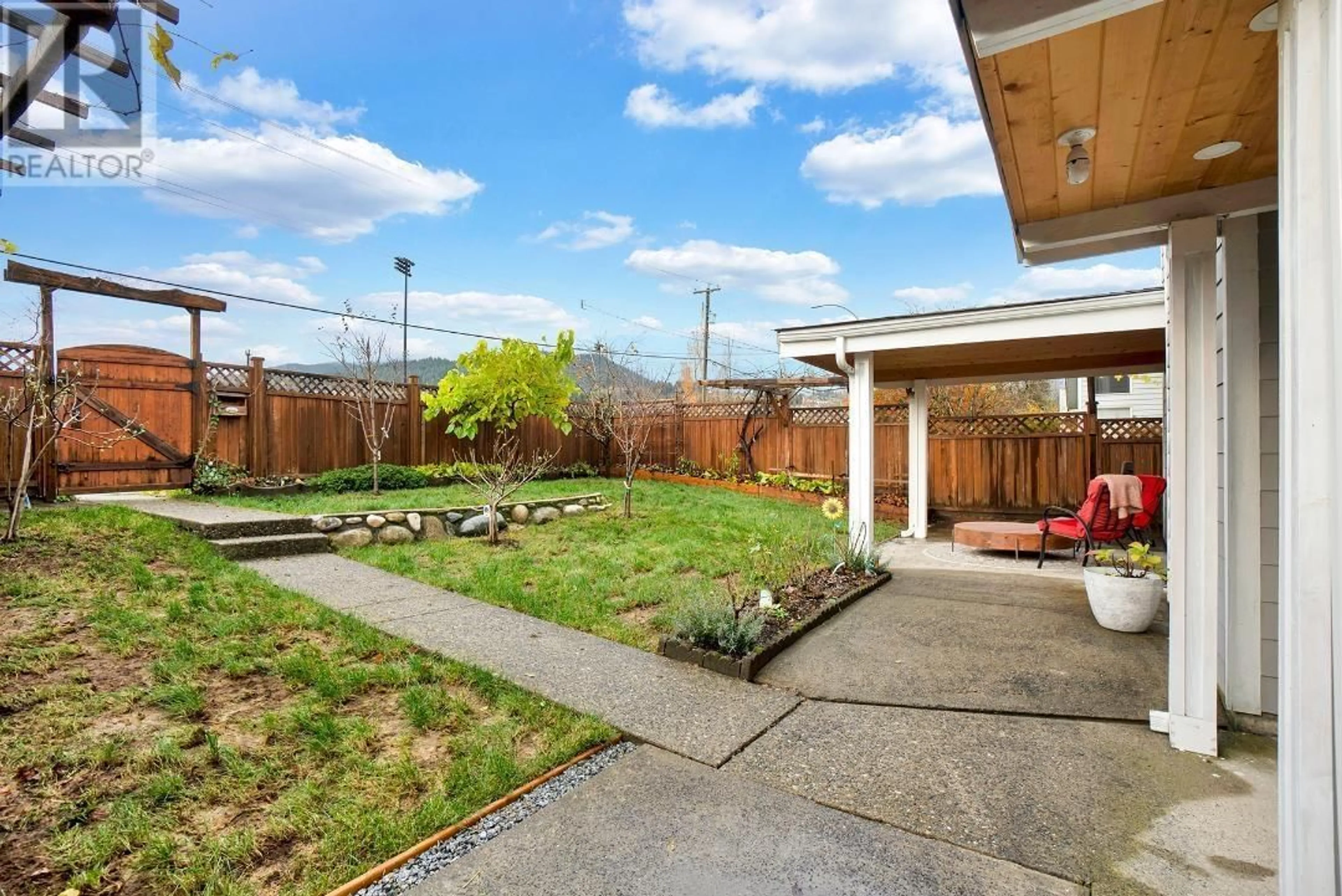 Patio, the fenced backyard for 1269 PIPELINE ROAD, Coquitlam British Columbia V3E2E4