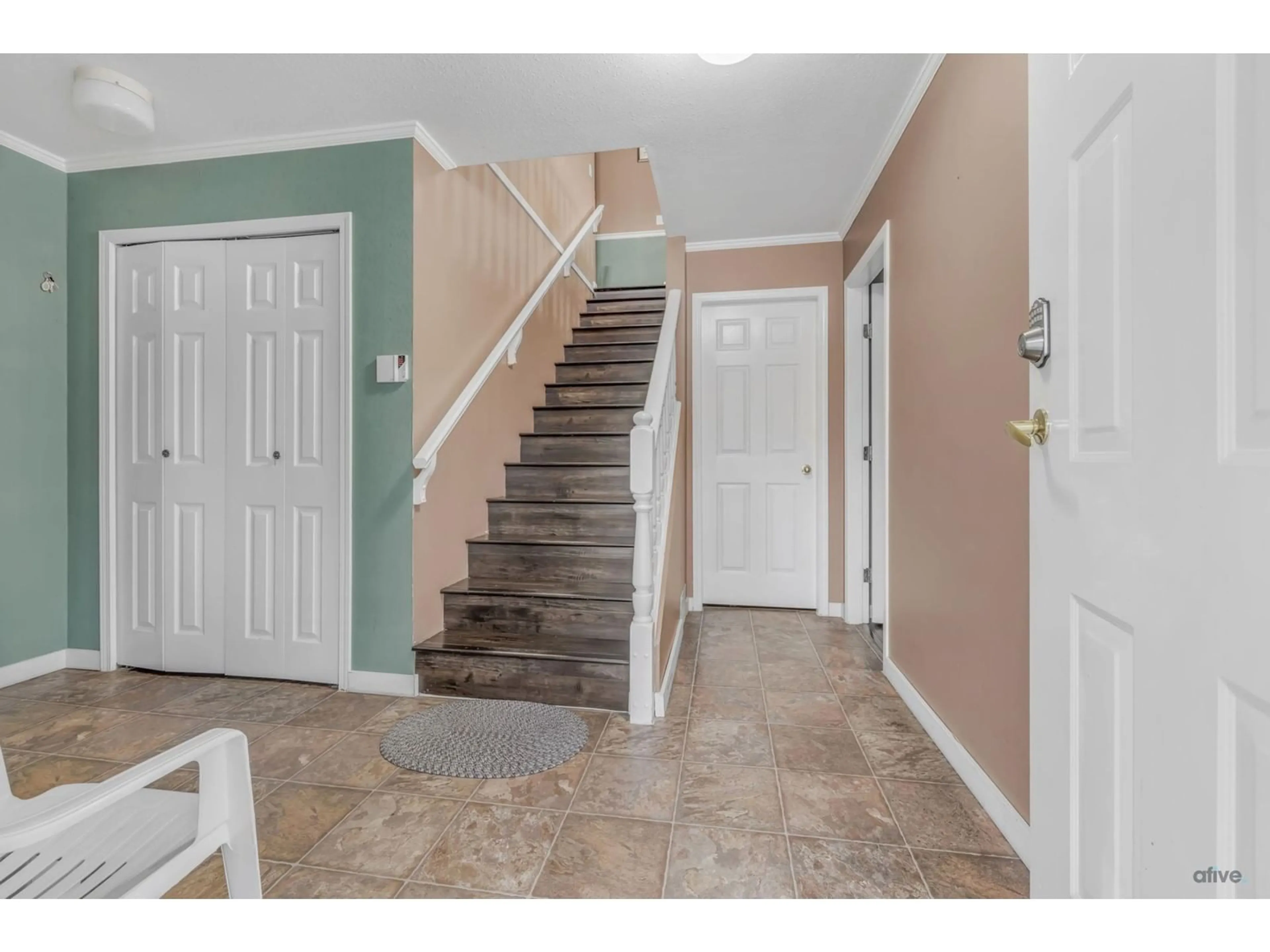 Indoor entryway, cement floor for 15756 82 AVENUE, Surrey British Columbia V4N0R7