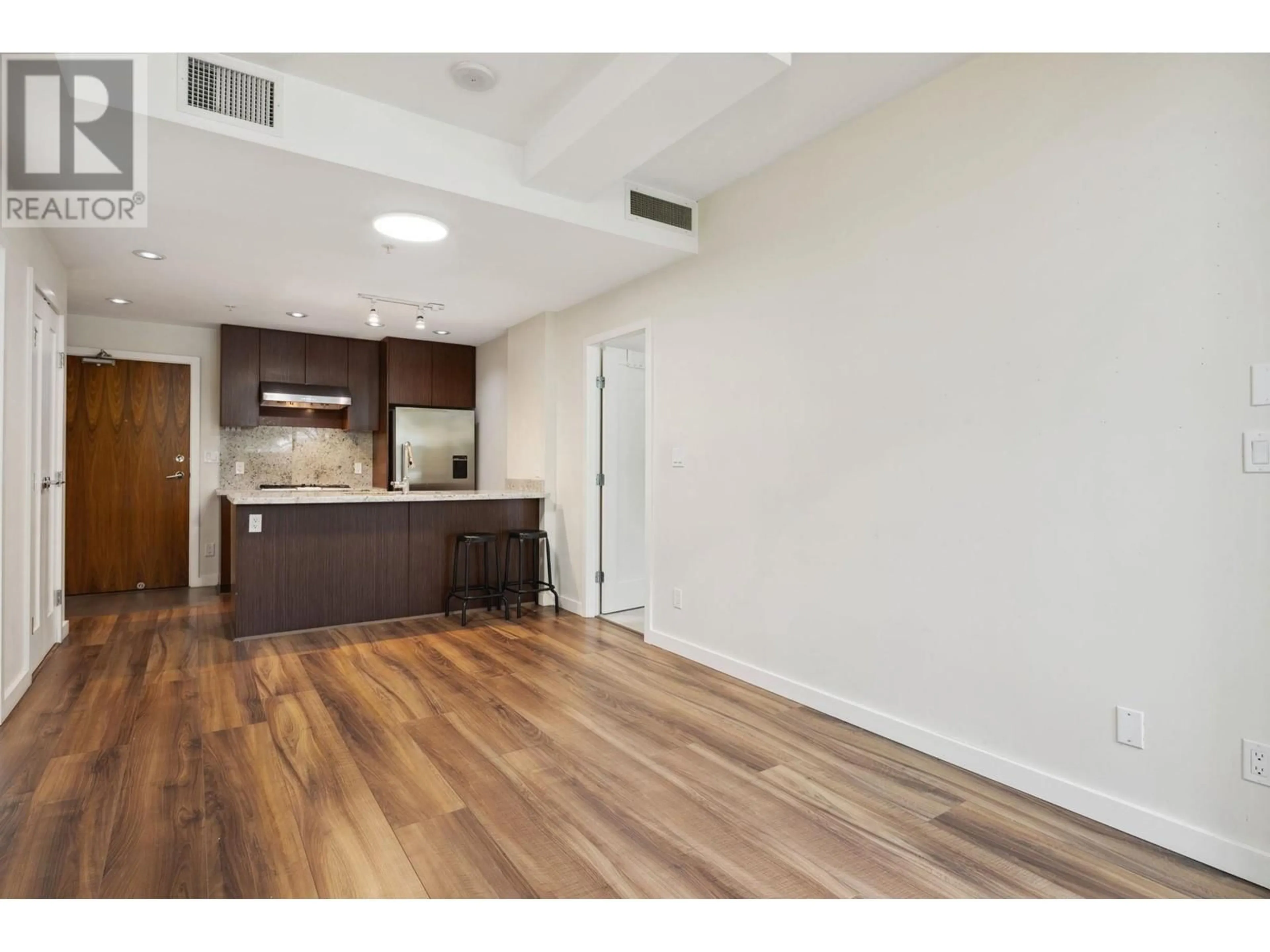 A pic of a room, wood floors for 515 8633 CAPSTAN WAY, Richmond British Columbia V6X0N5