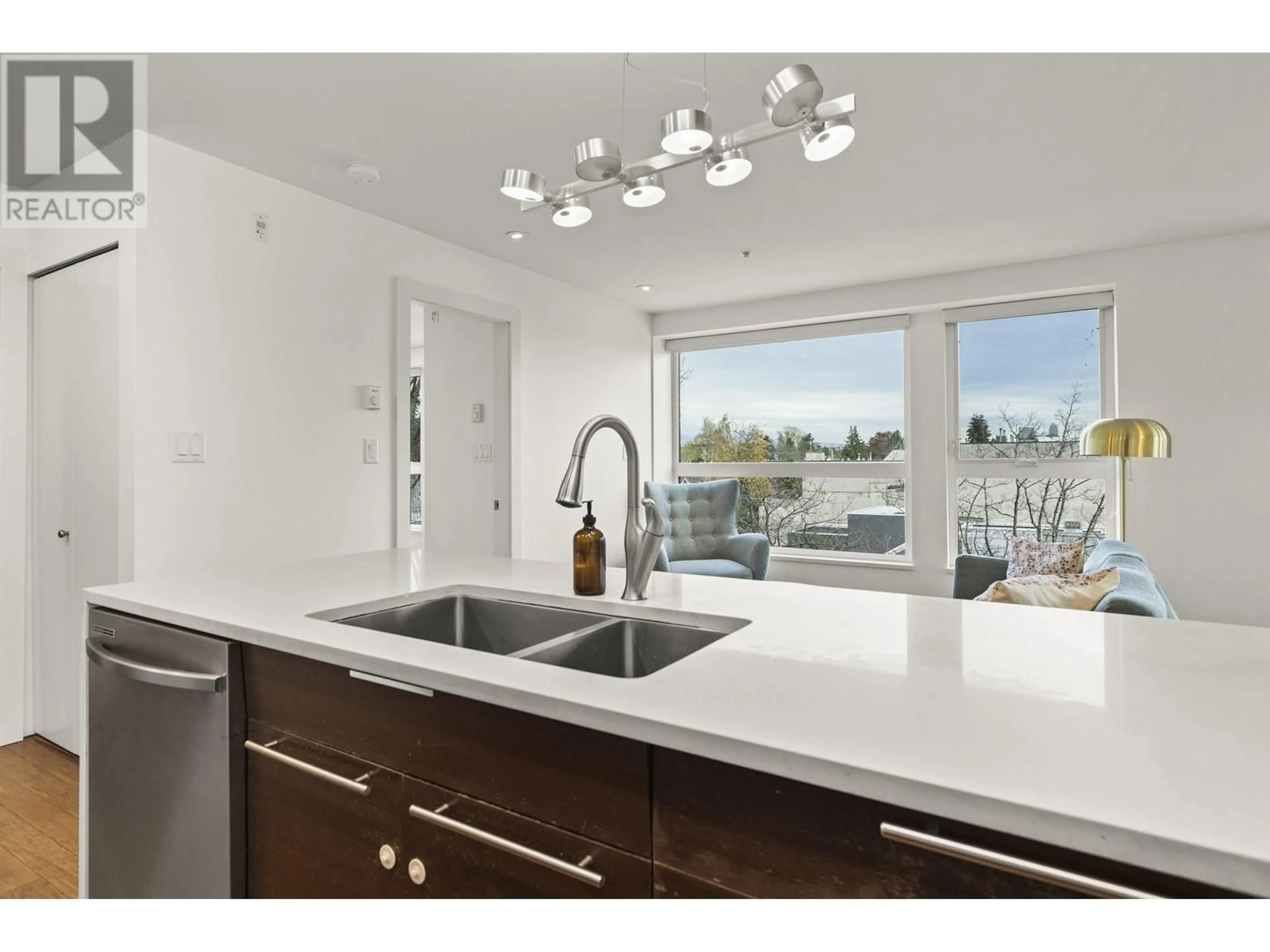 Open concept kitchen for 402 2481 WATERLOO STREET, Vancouver British Columbia V6R3H4