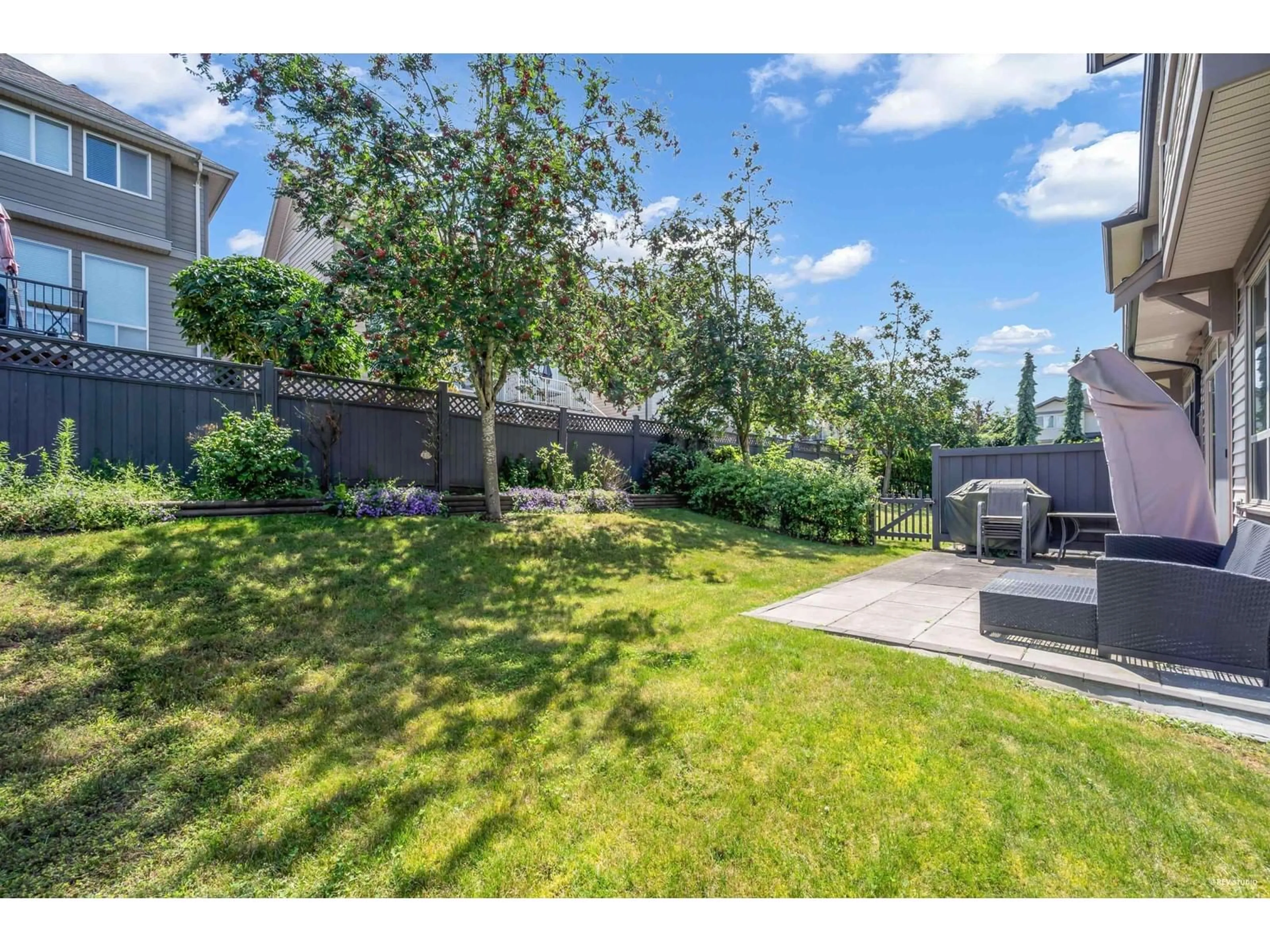 A pic from exterior of the house or condo, the fenced backyard for 29 10595 DELSOM CRESCENT, Delta British Columbia V4C0C2