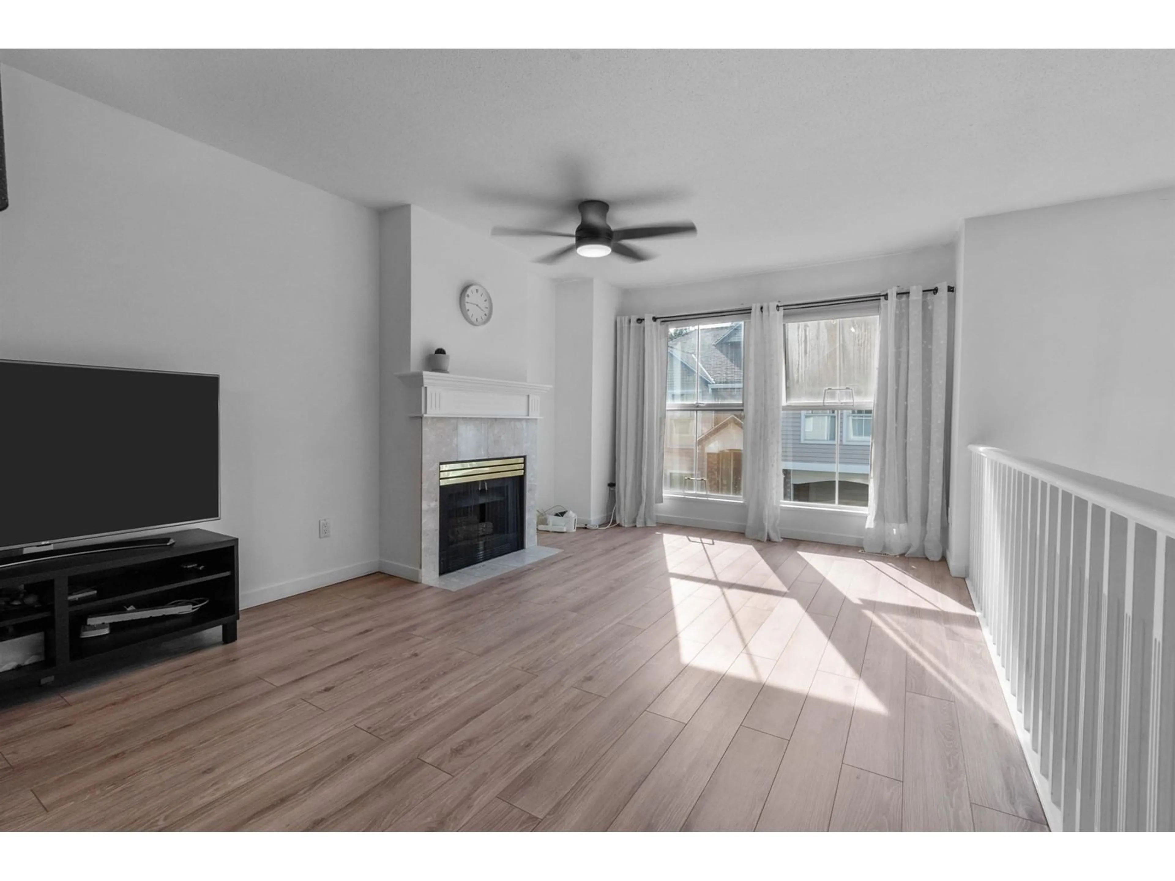 A pic of a room, wood floors for 6 8716 WALNUT GROVE DRIVE, Langley British Columbia V1M2K2