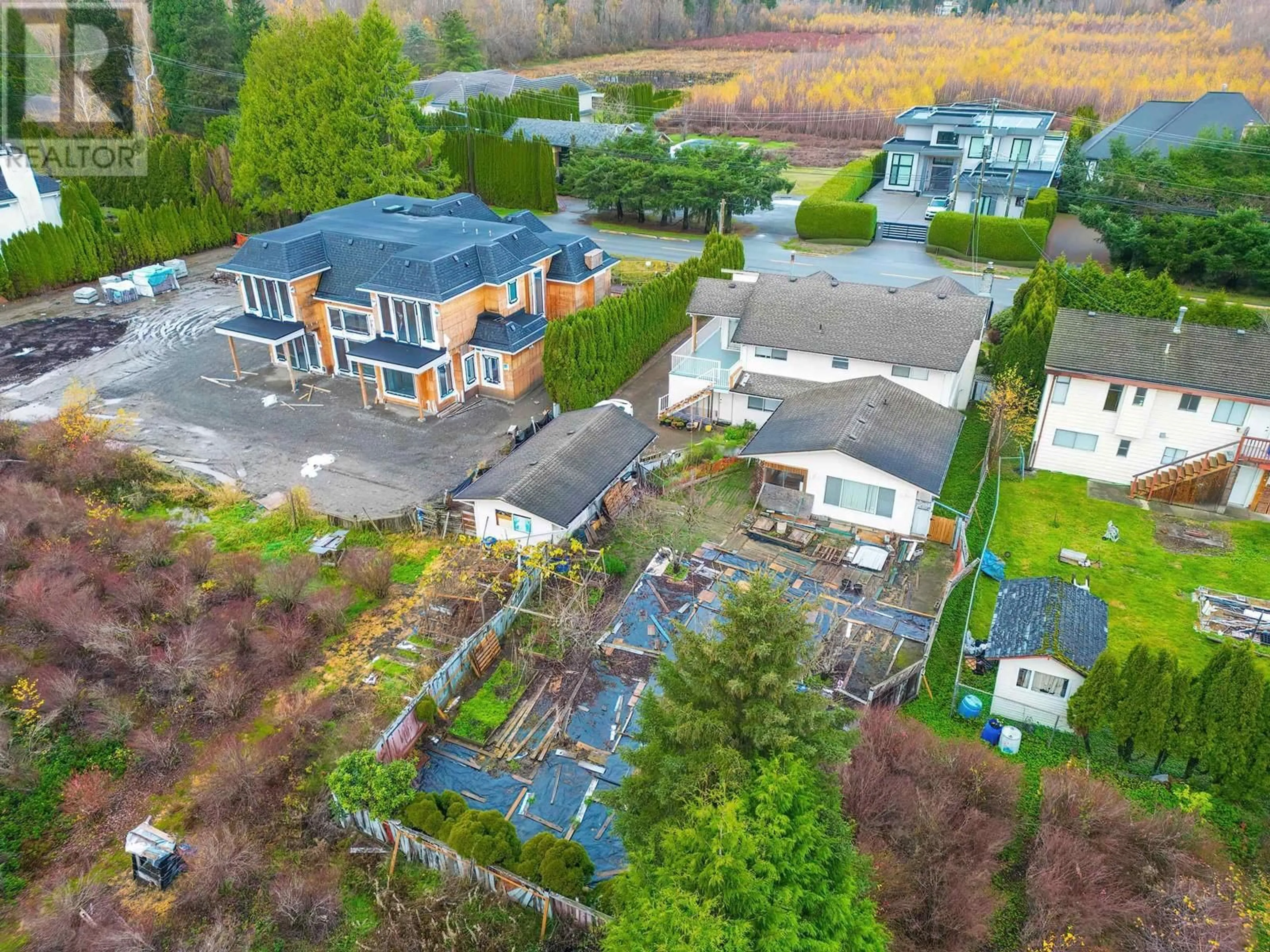 A pic from exterior of the house or condo, the fenced backyard for 10560 GRANVILLE AVENUE, Richmond British Columbia V6Y1R4