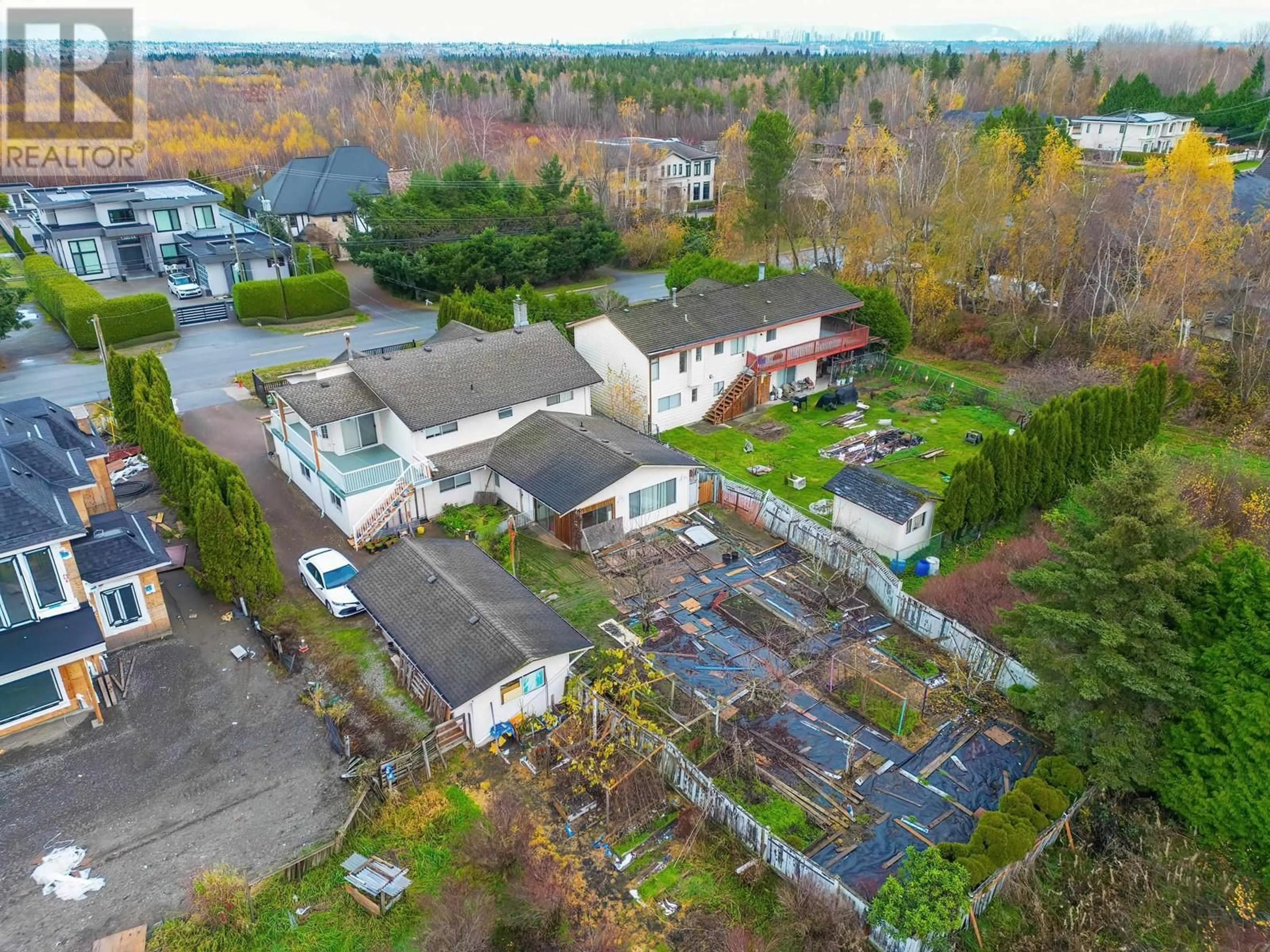 A pic from exterior of the house or condo, the fenced backyard for 10560 GRANVILLE AVENUE, Richmond British Columbia V6Y1R4