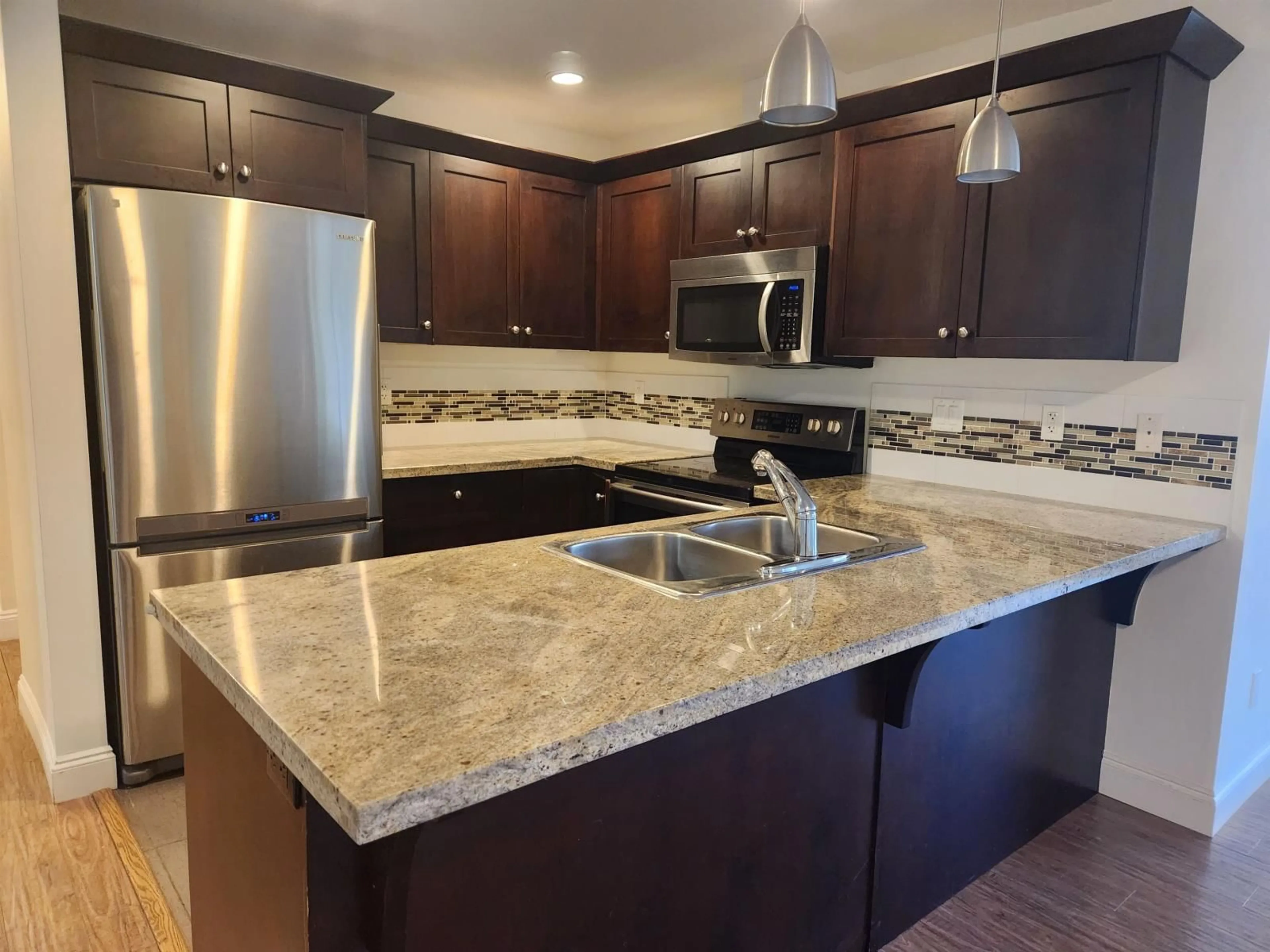 Open concept kitchen, ceramic/tile floor for 304 - 45640 ALMA AVENUE, Chilliwack British Columbia V2R0P8