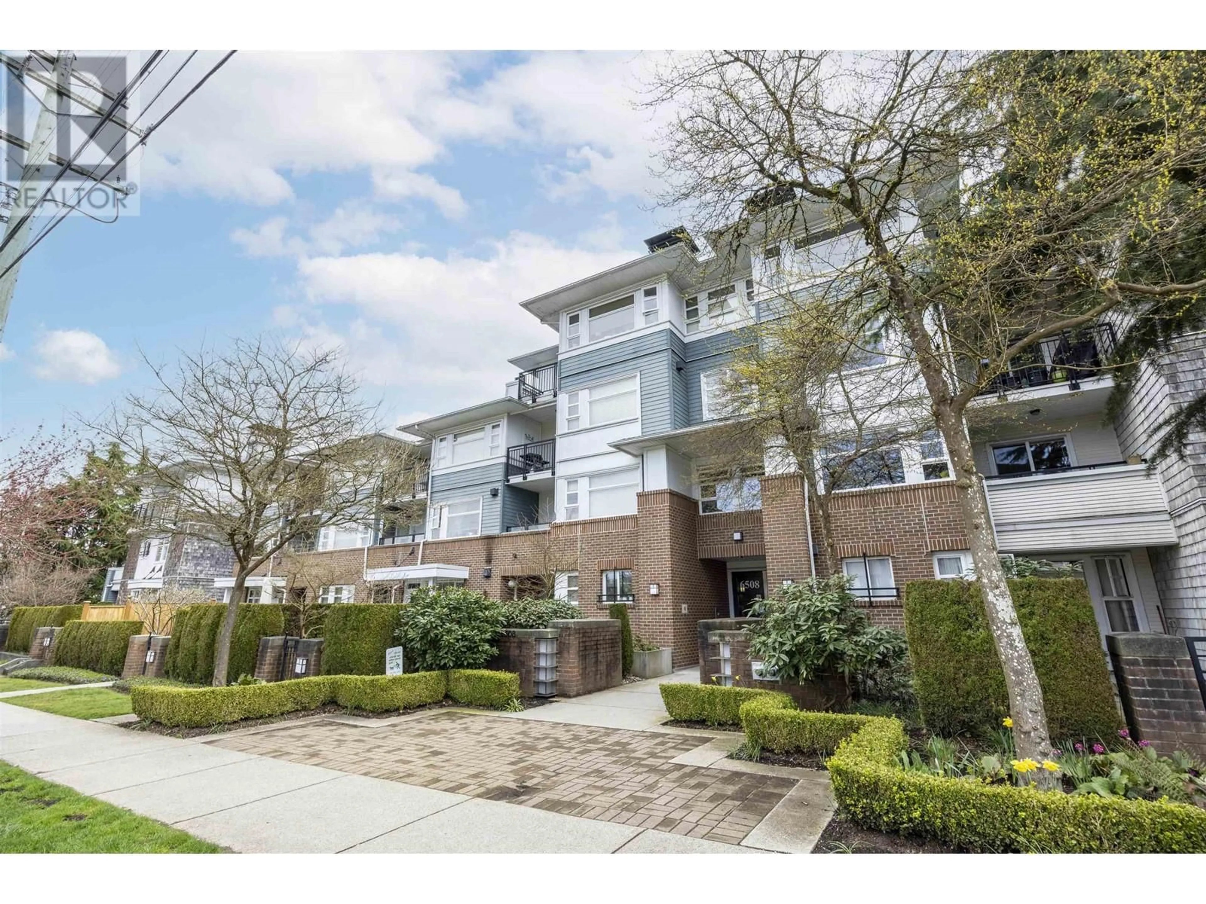 A pic from exterior of the house or condo, the street view for 218 6508 DENBIGH AVENUE, Burnaby British Columbia V5H4W6