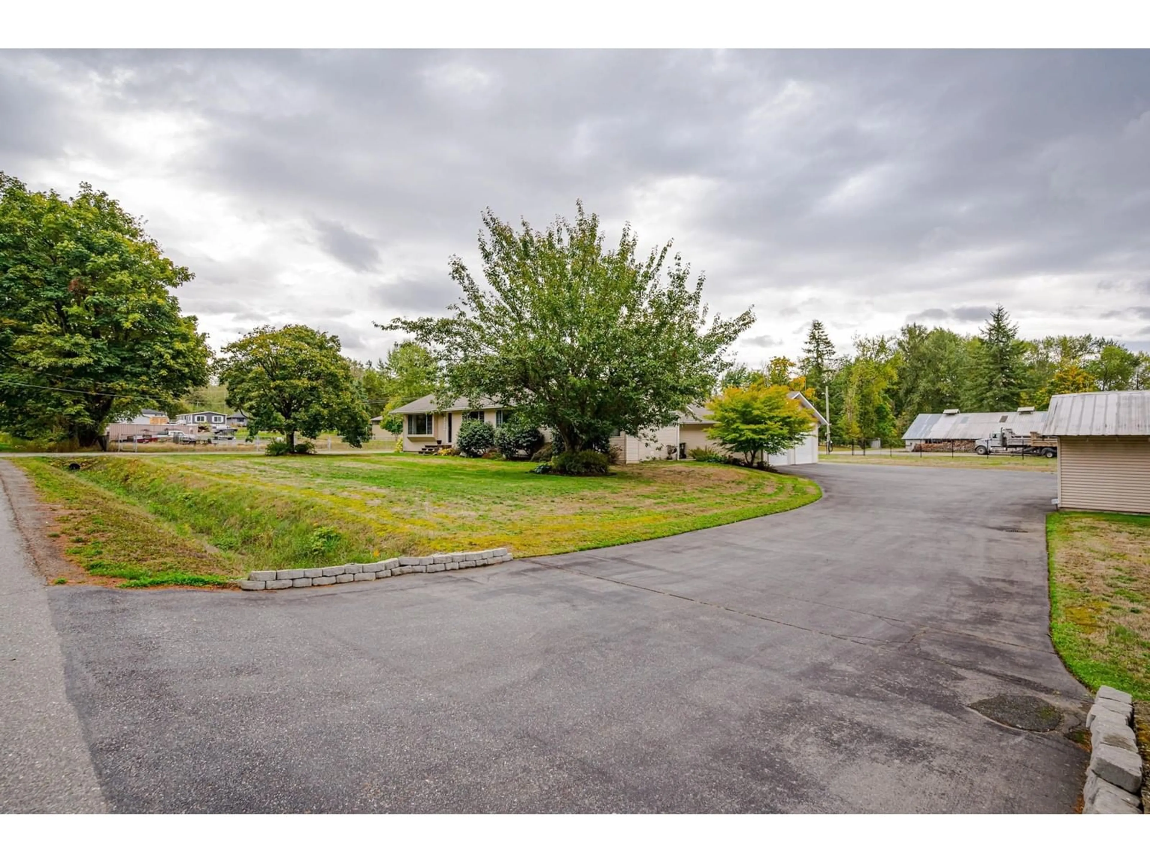 Frontside or backside of a home, the street view for 19810 20 AVENUE, Langley British Columbia V2Z1Z3