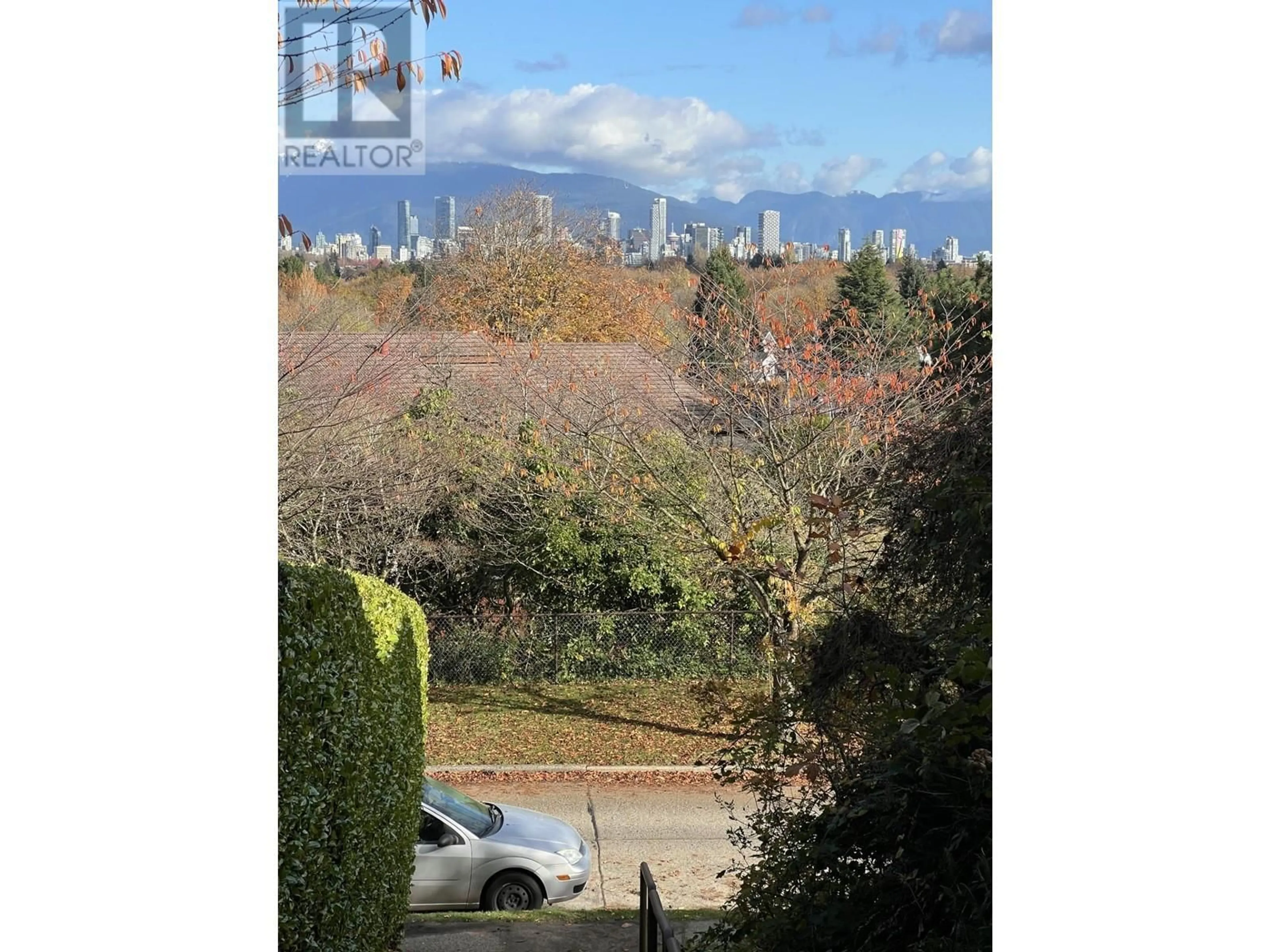A pic from outside/outdoor area/front of a property/back of a property/a pic from drone, forest/trees view for 3311 QUESNEL DRIVE, Vancouver British Columbia V6S1Z7