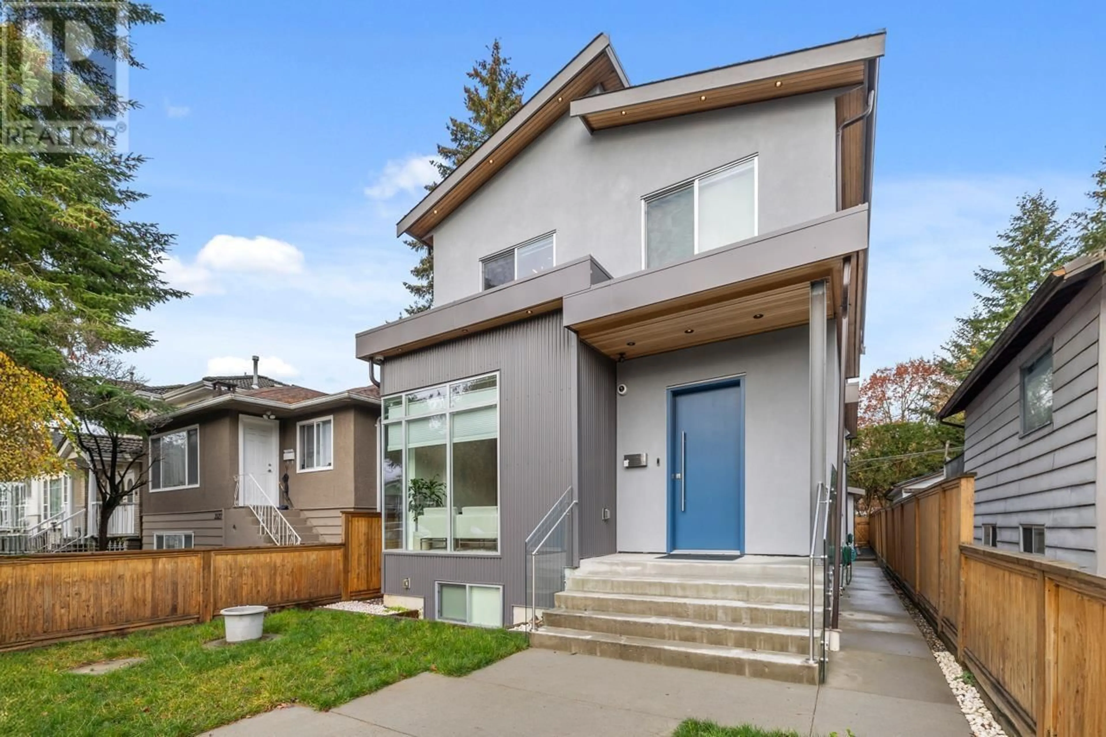 Frontside or backside of a home, the fenced backyard for 3531 TANNER STREET, Vancouver British Columbia V5R5P4