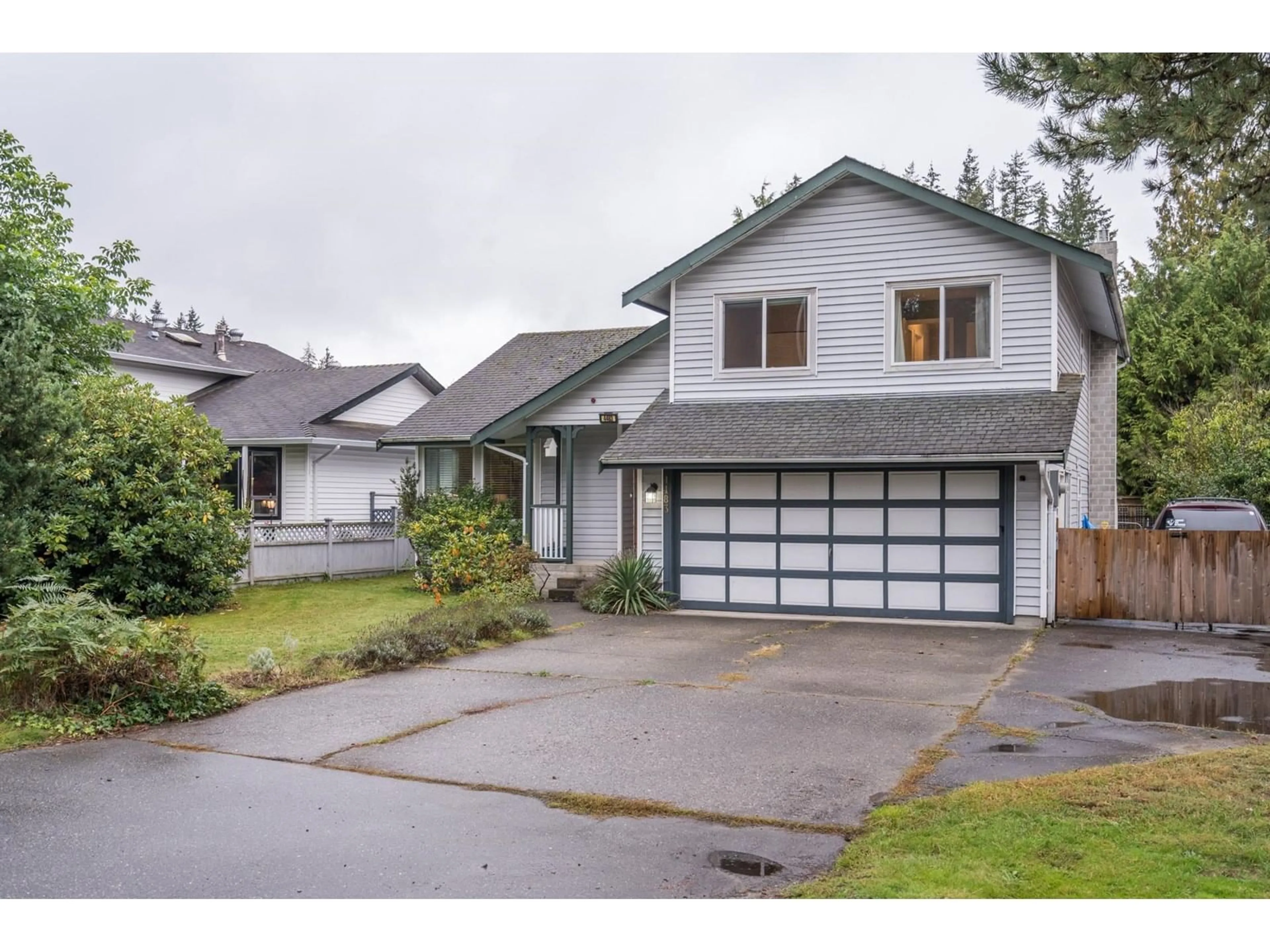 Frontside or backside of a home, the street view for 4483 208 STREET, Langley British Columbia V3A2H7