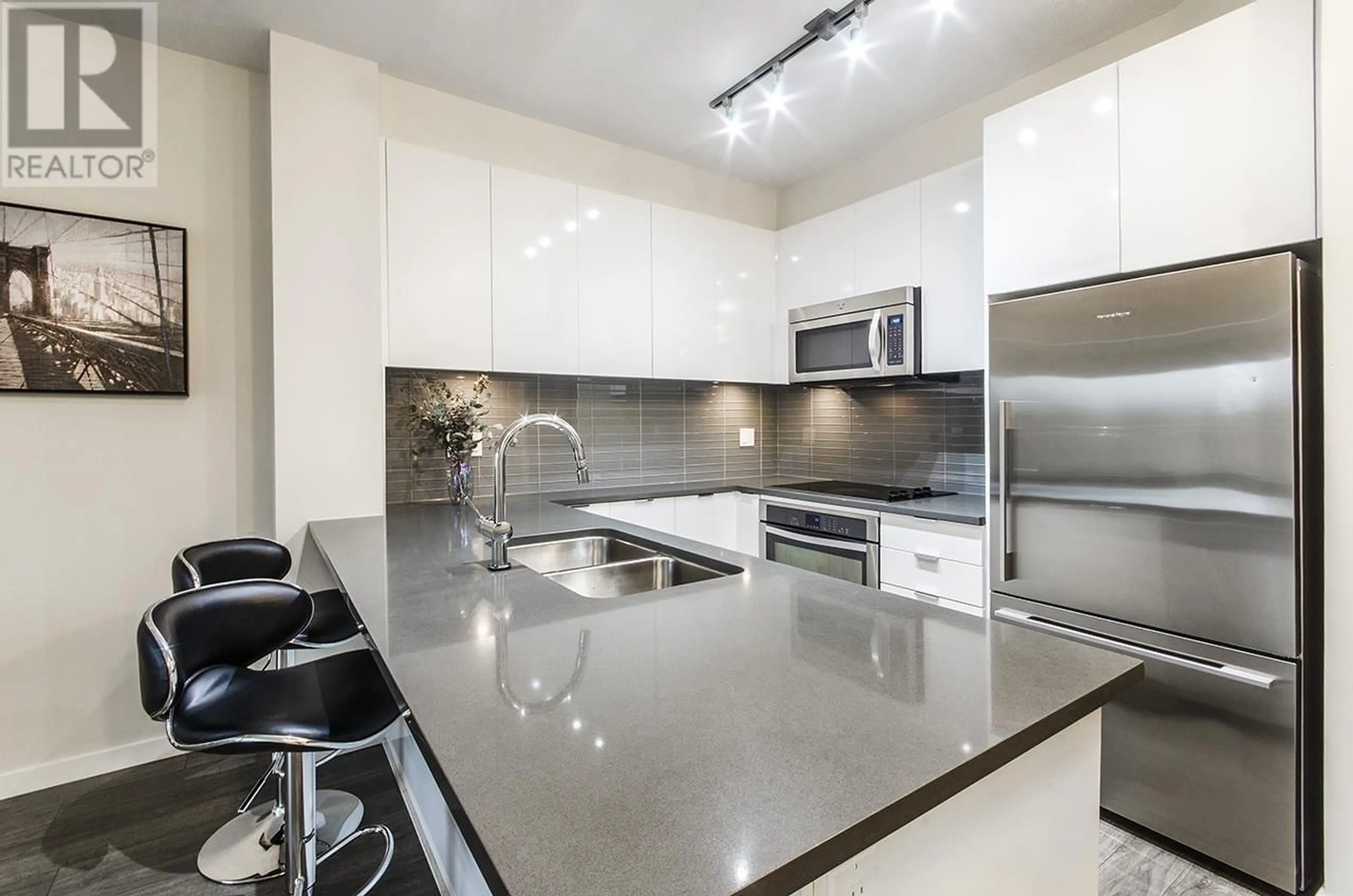 Contemporary kitchen, ceramic floors for 320 2665 MOUNTAIN HIGHWAY, North Vancouver British Columbia V7J0A8