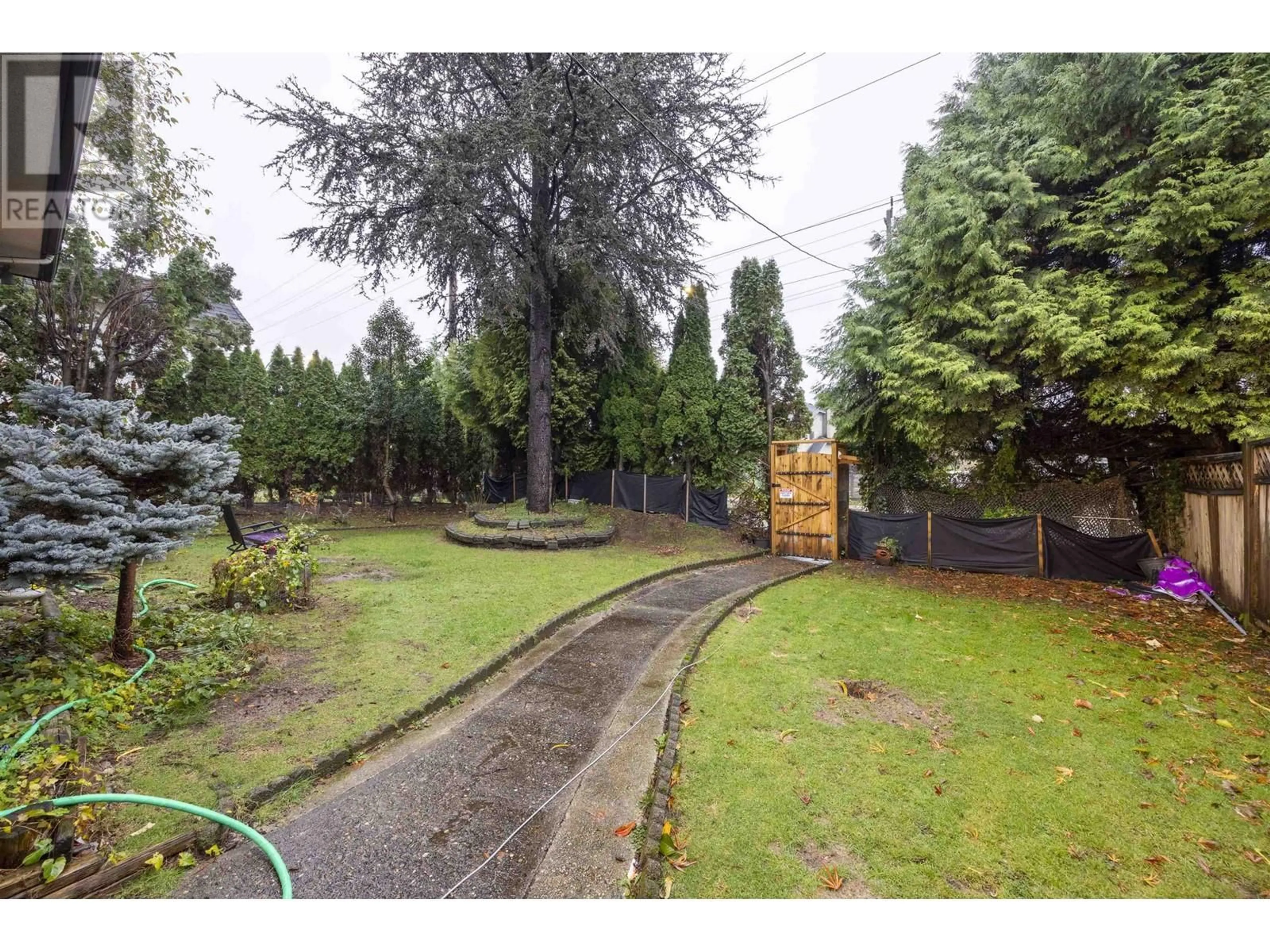 Patio, the fenced backyard for 1215 COMO LAKE AVENUE, Coquitlam British Columbia V3J7R5