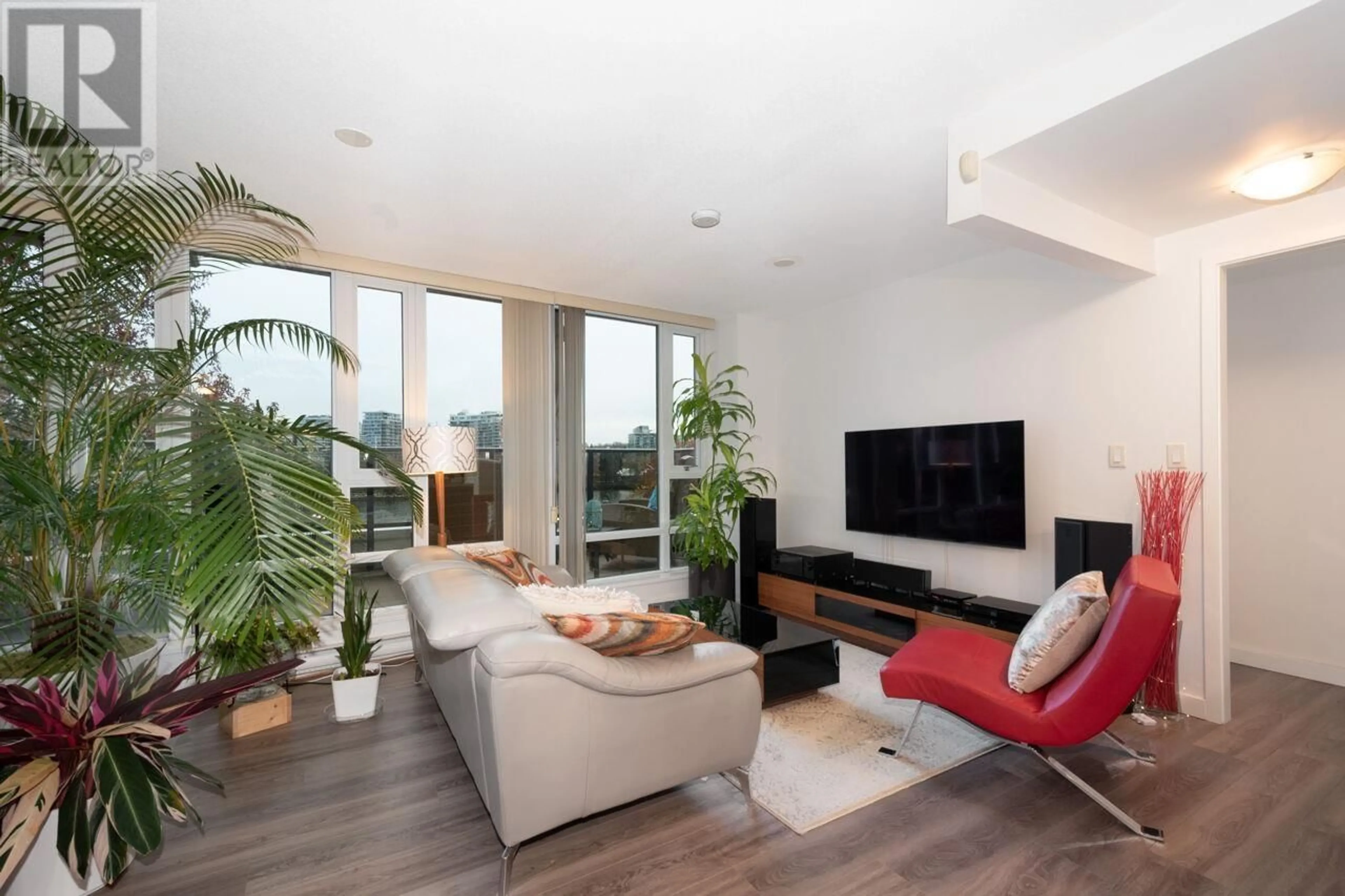 Living room, wood floors for 303 918 COOPERAGE WAY, Vancouver British Columbia V6B0A7