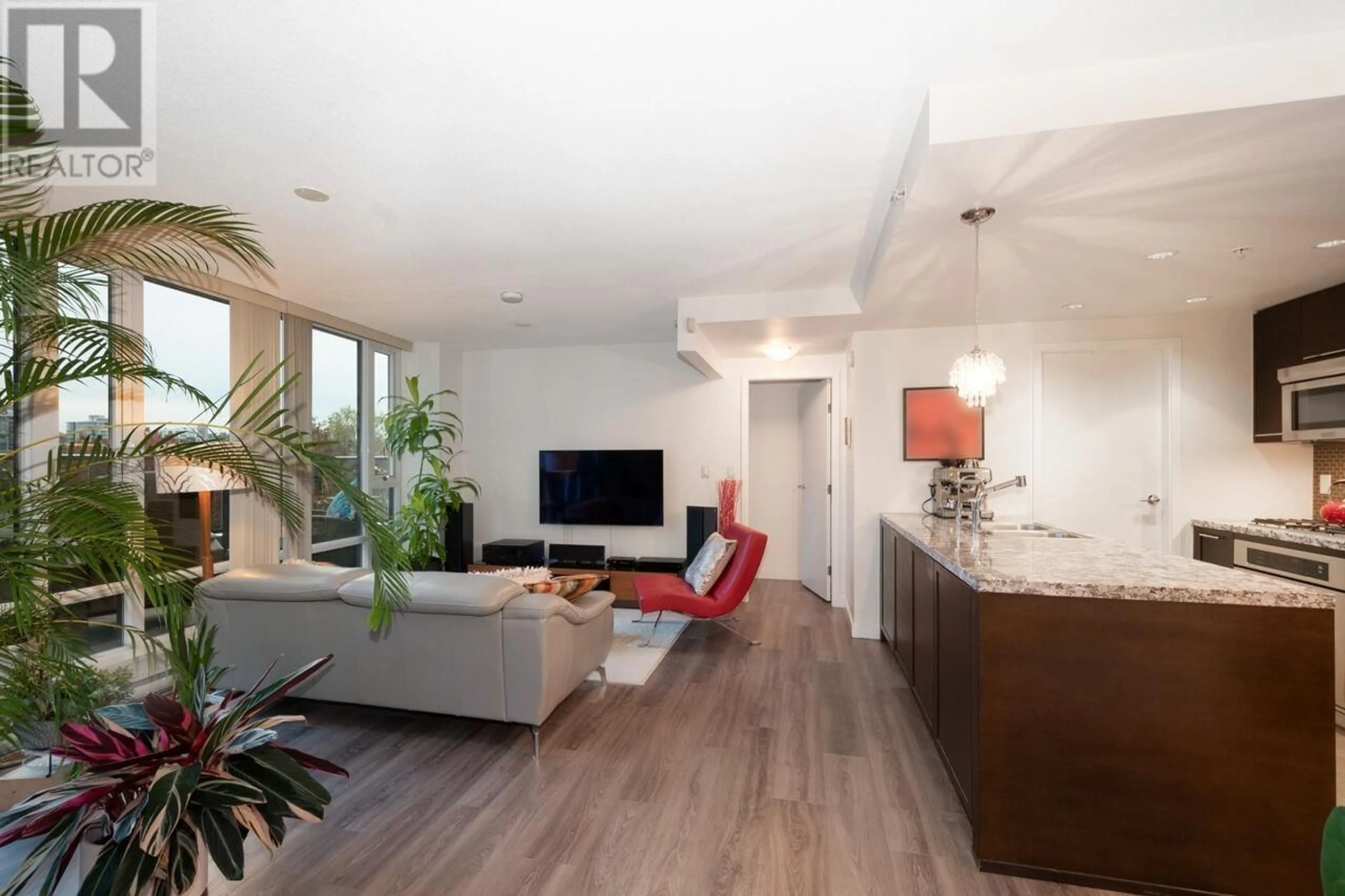 Living room, wood floors for 303 918 COOPERAGE WAY, Vancouver British Columbia V6B0A7