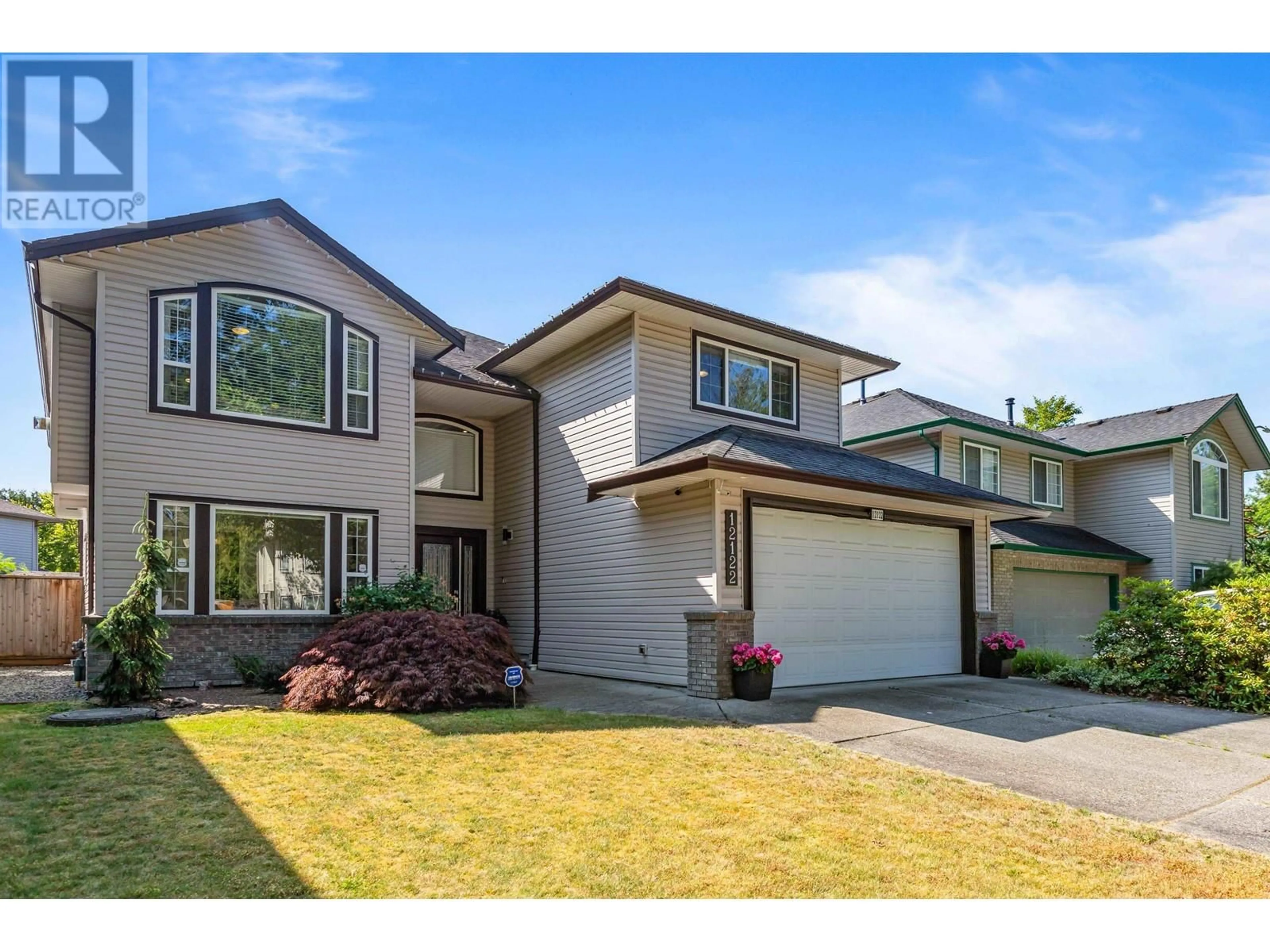 Frontside or backside of a home, the street view for 12122 238B STREET, Maple Ridge British Columbia V4R2T6