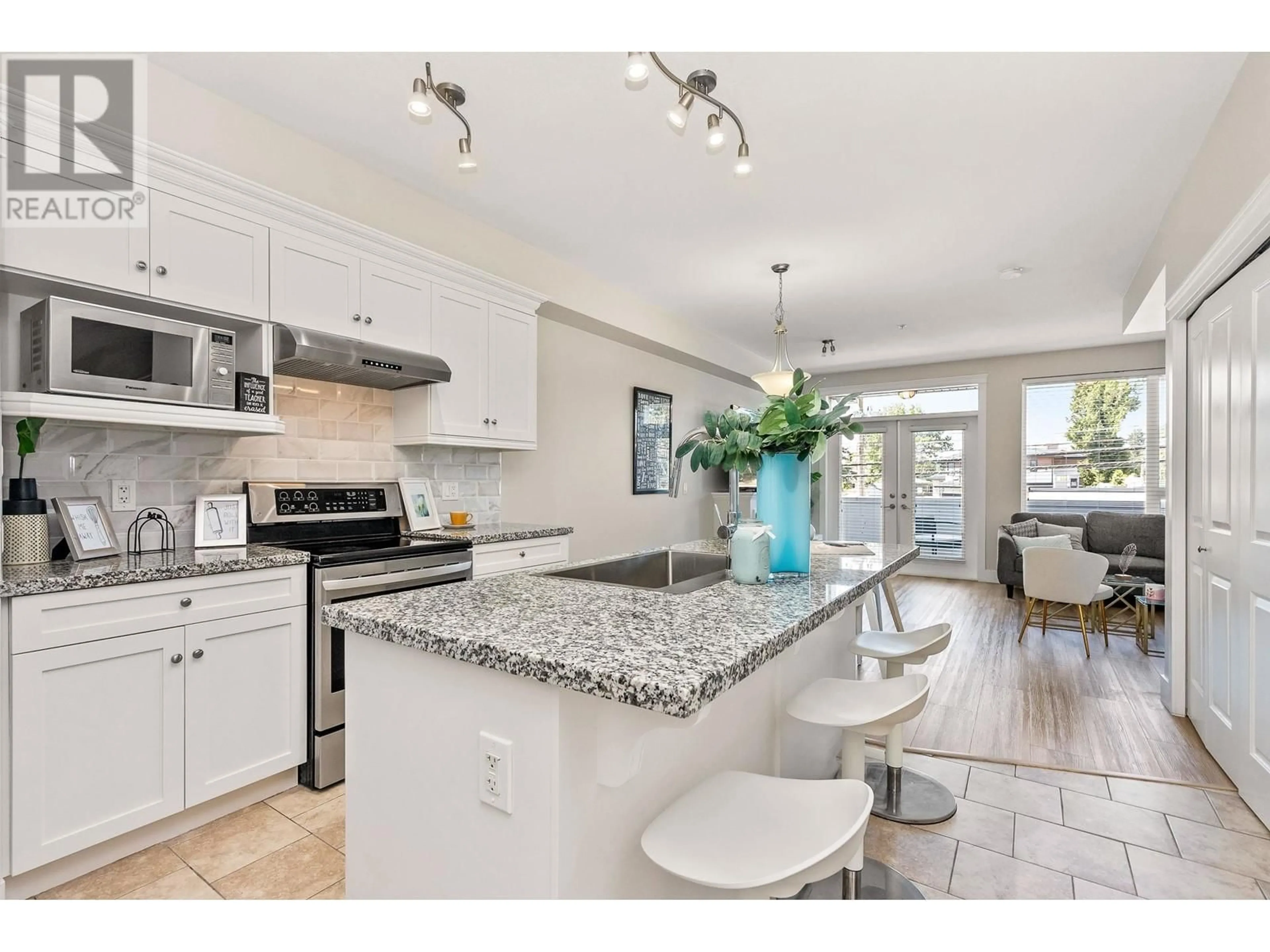 Open concept kitchen for 211 7908 GRAHAM AVENUE, Burnaby British Columbia V3N1V9