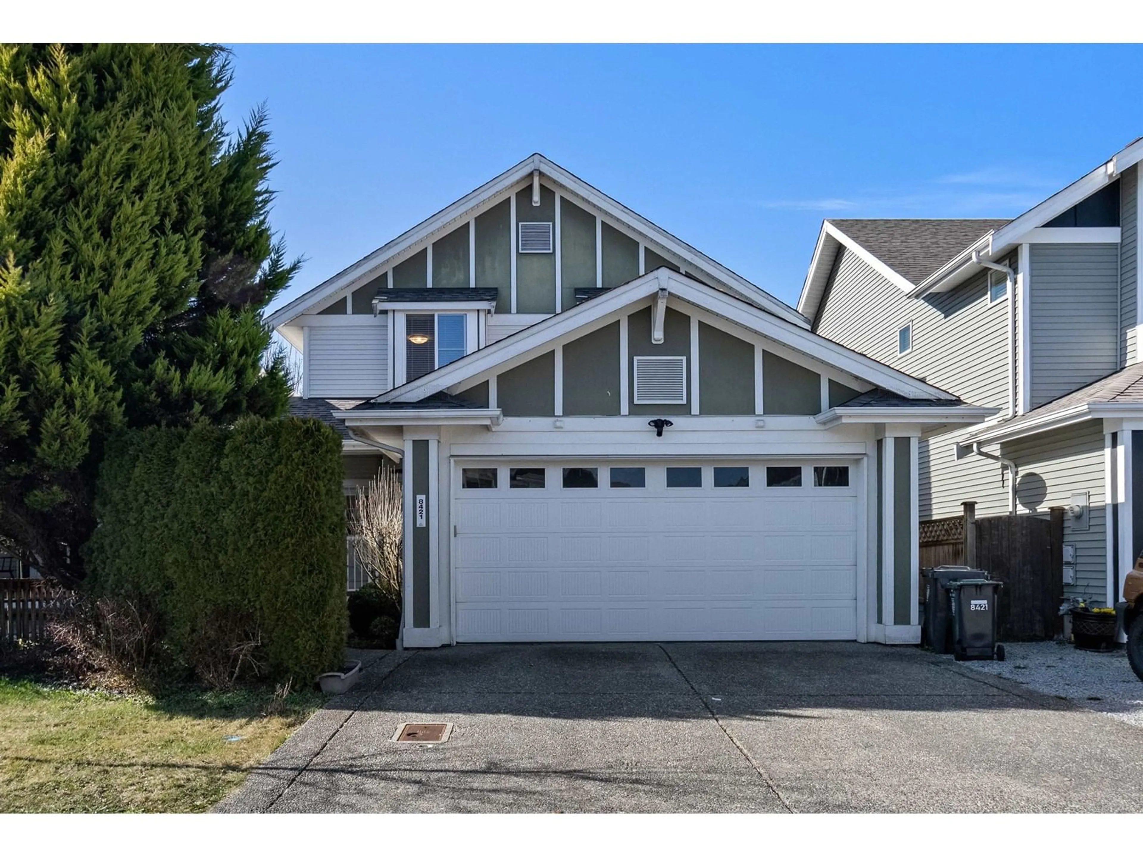 Frontside or backside of a home, the street view for 8421 209 STREET, Langley British Columbia V2Y0A3