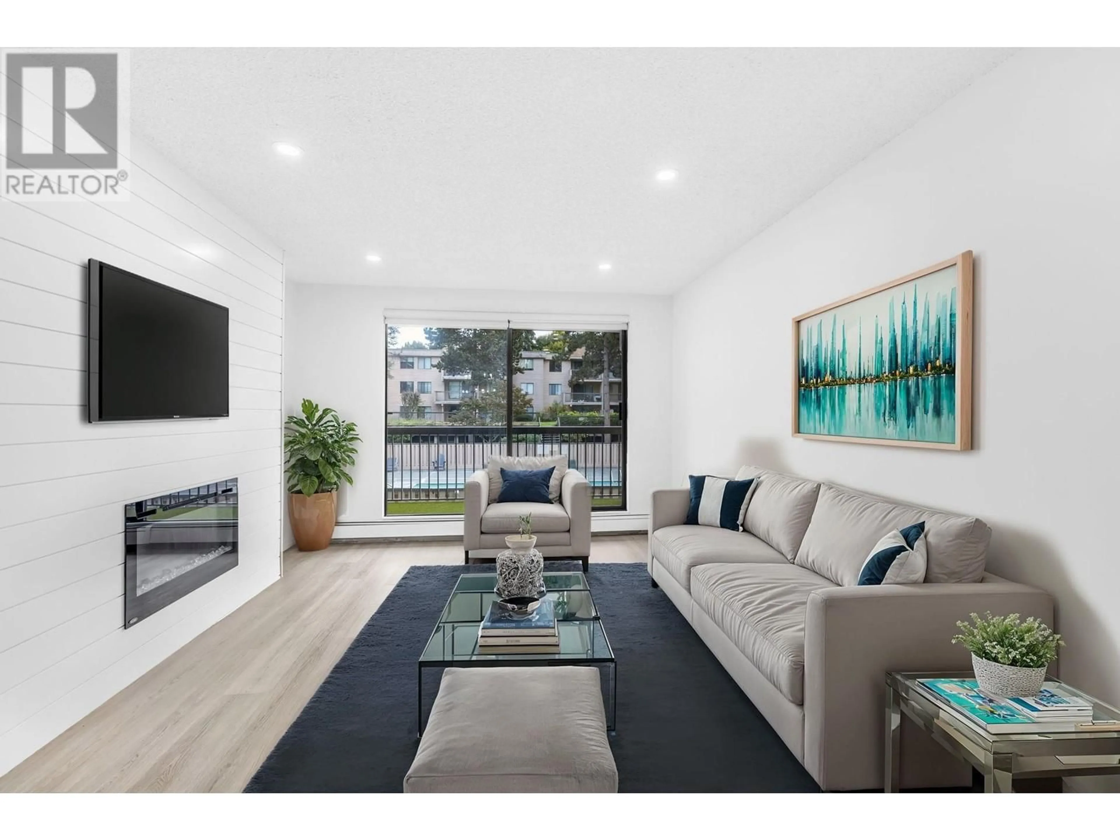 Living room, wood floors for 124 8411 ACKROYD ROAD, Richmond British Columbia V6X3E6