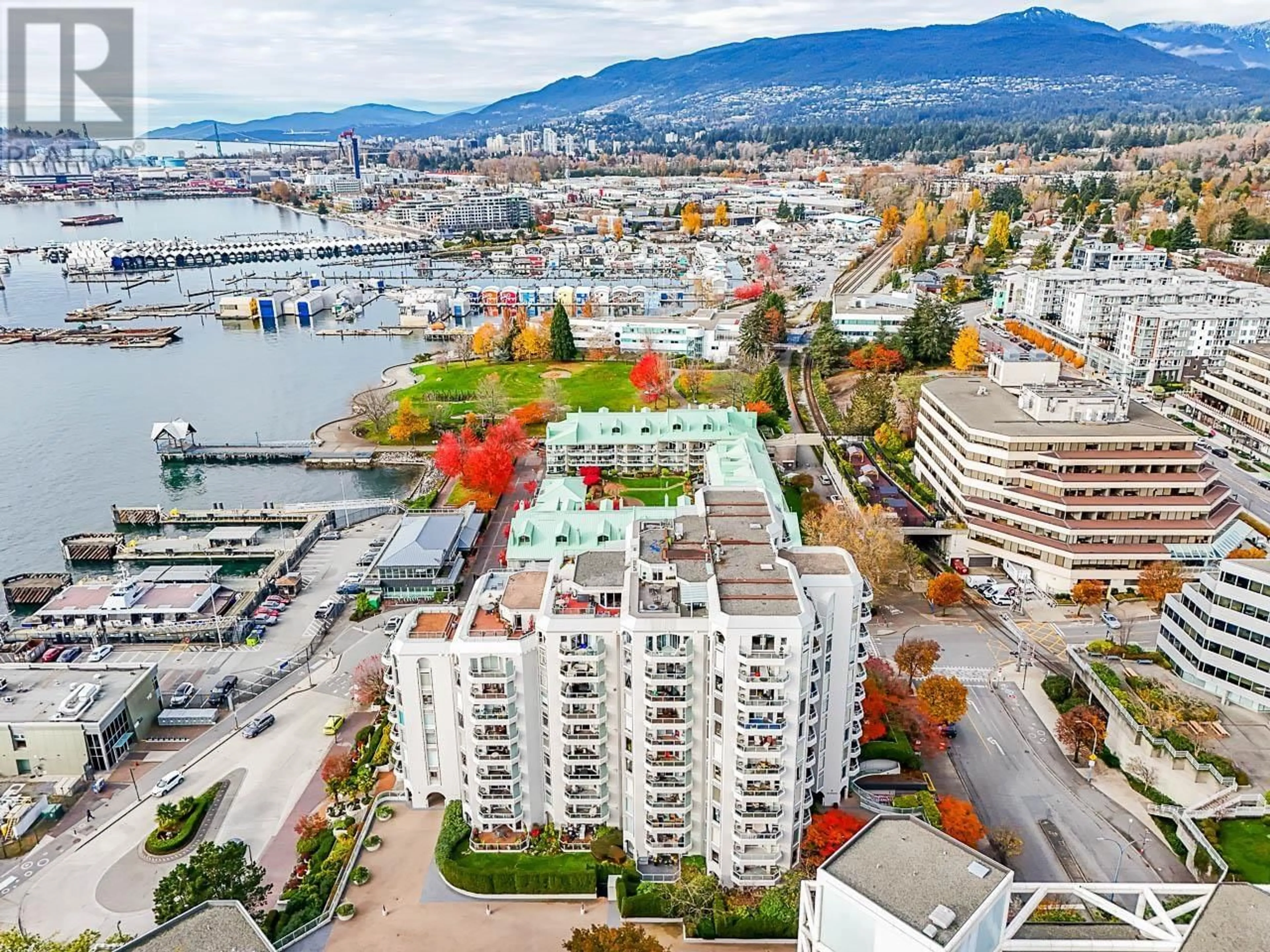 A pic from exterior of the house or condo, the view of city buildings for 306 168 CHADWICK COURT, North Vancouver British Columbia V7M3L4