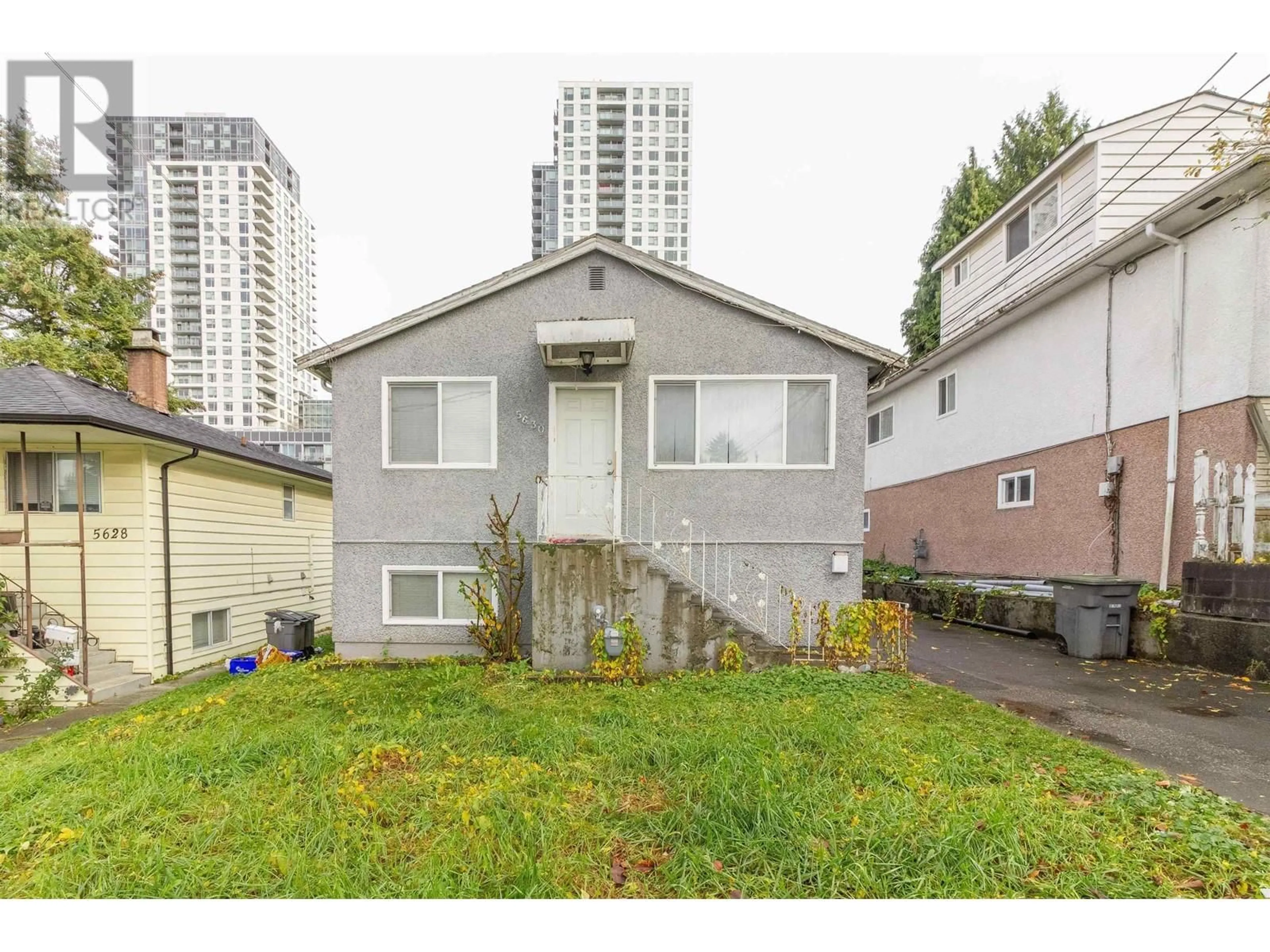 Frontside or backside of a home, the fenced backyard for 5630 LINCOLN STREET, Vancouver British Columbia V5R4P4