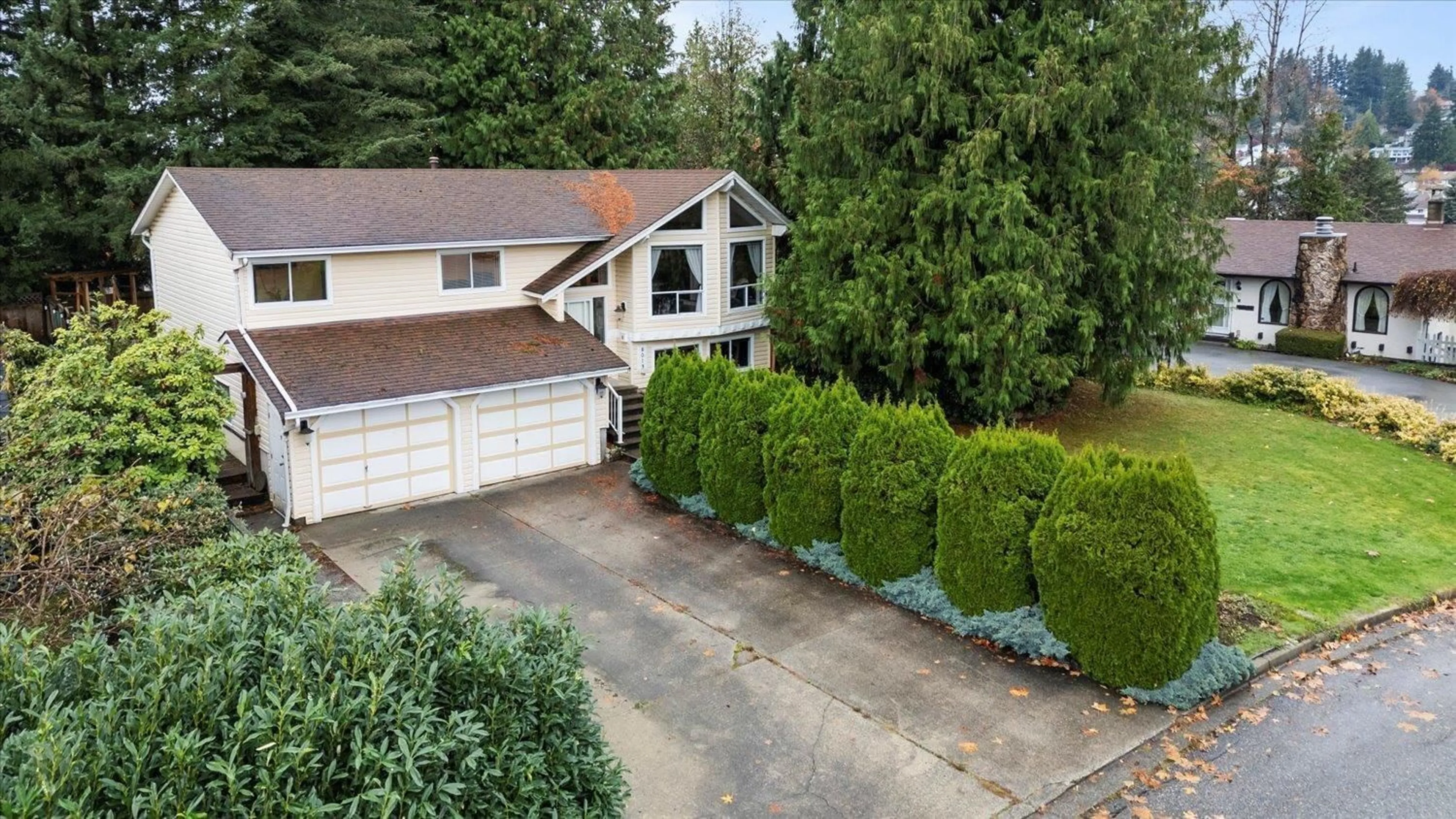 Frontside or backside of a home, the fenced backyard for 8013 DUNSMUIR STREET, Mission British Columbia V2V4S2