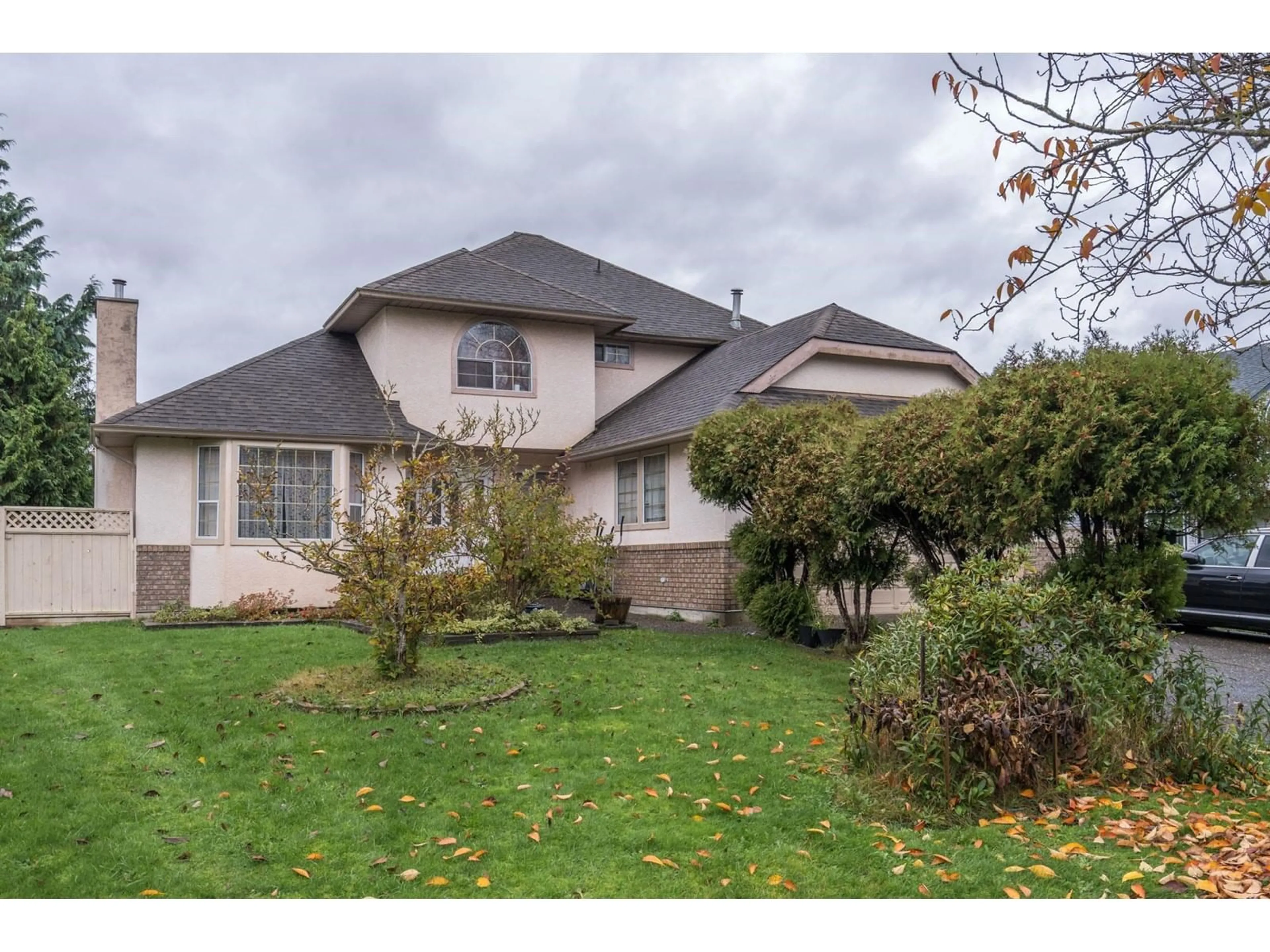 Frontside or backside of a home, the street view for 4451 224 STREET, Langley British Columbia V2Z1A8