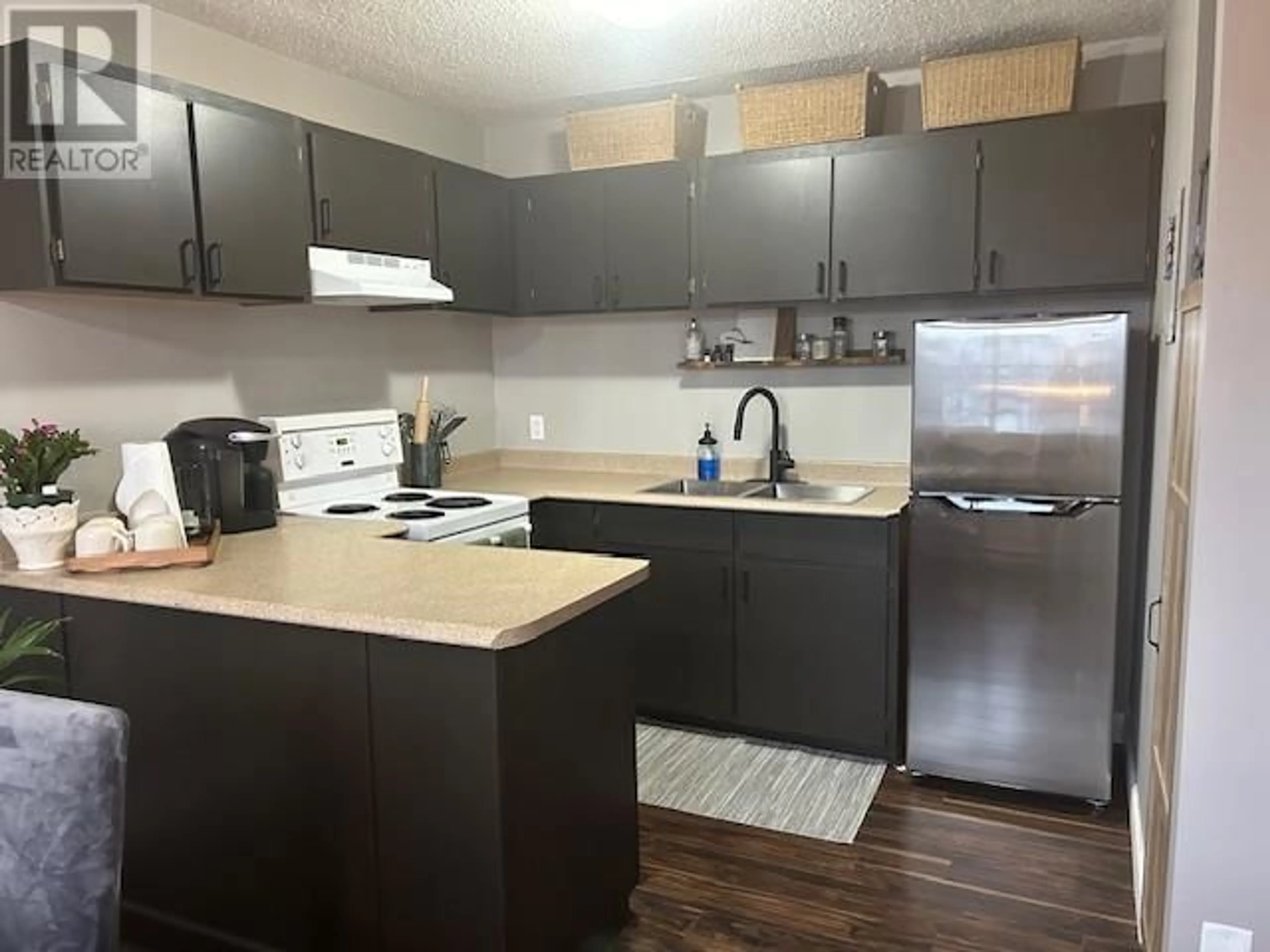 Standard kitchen, wood floors, cottage for 12 1012 E CENTRAL STREET, Prince George British Columbia V2M3B9